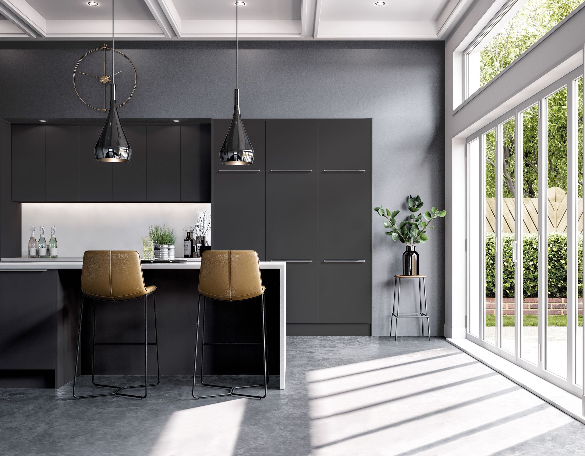 A modern kitchen featuring matte charcoal cabinetry, a white island, two tan bar stools, and sunlight from glass doors.