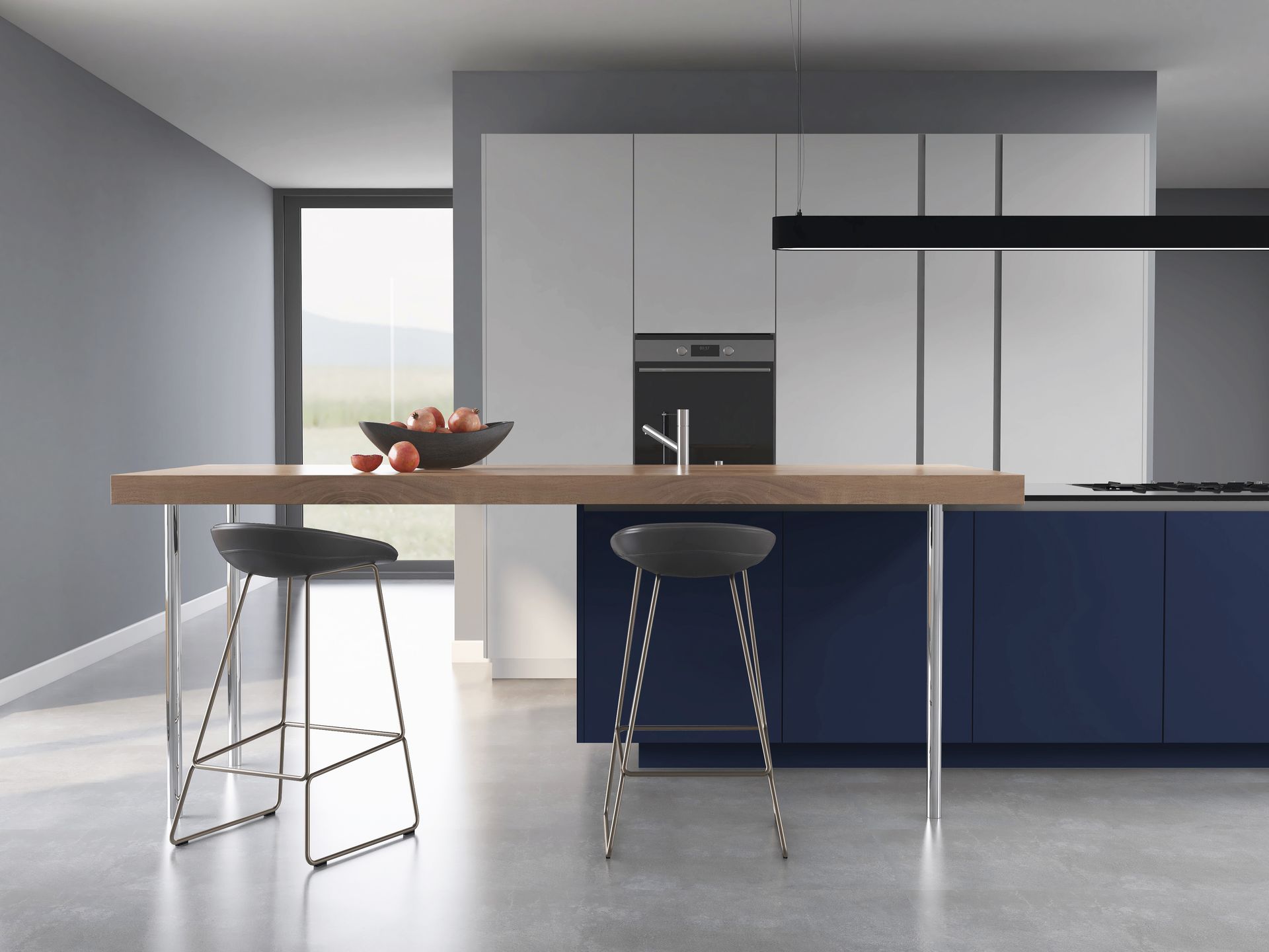 Modern kitchen island with a wooden countertop and two dark stools, set against navy blue cabinets and light grey walls.