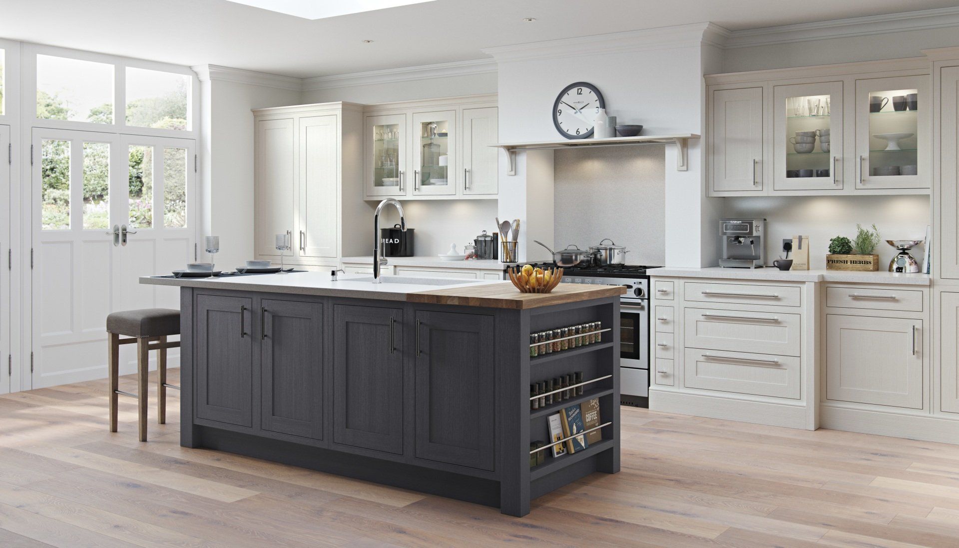 A bright, modern kitchen featuring a dark blue central island with a wooden countertop, light cabinetry, and a stool.