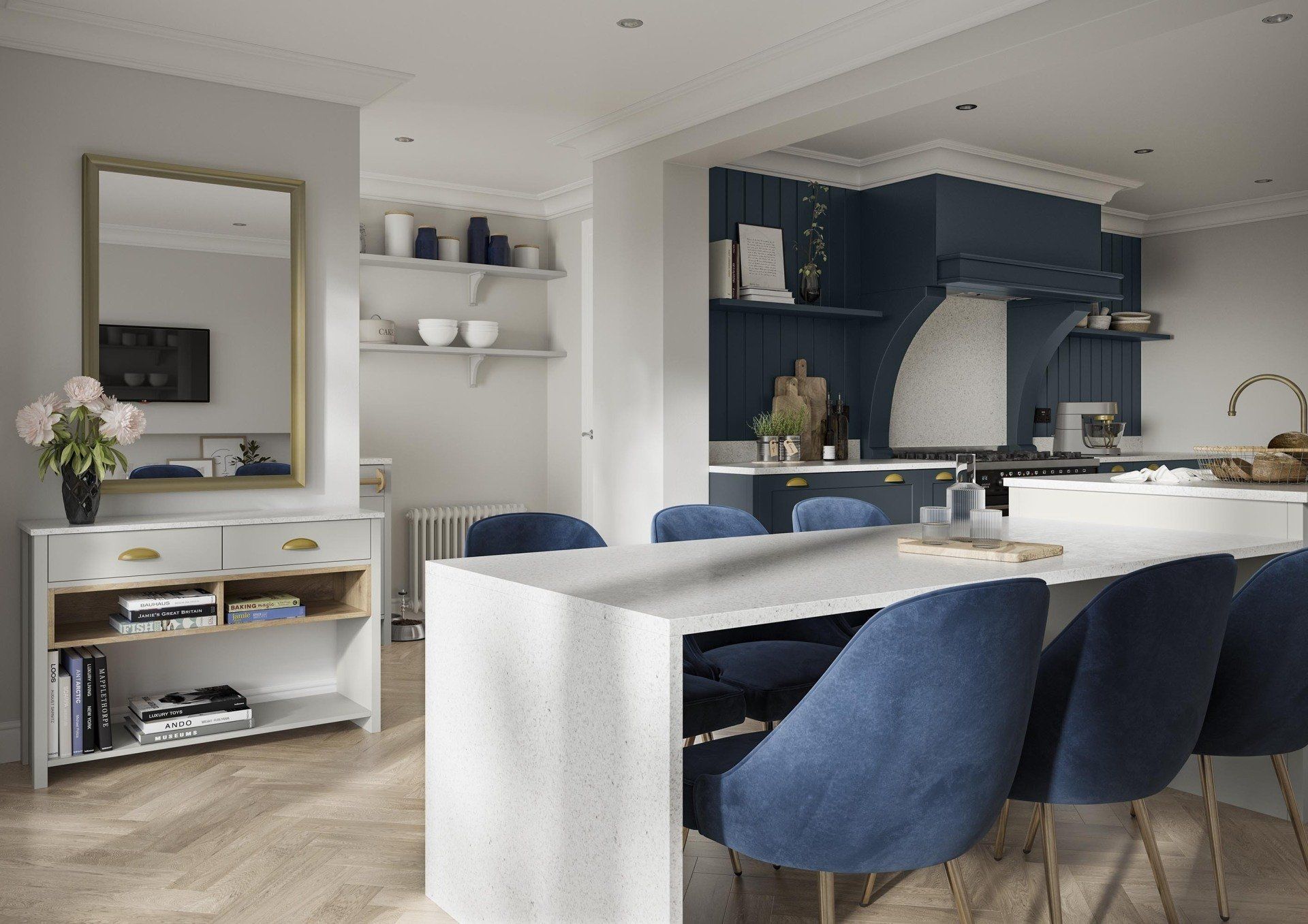 Modern kitchen with a white stone island, blue velvet chairs, dark blue cabinetry, and a console table with a large mirror.
