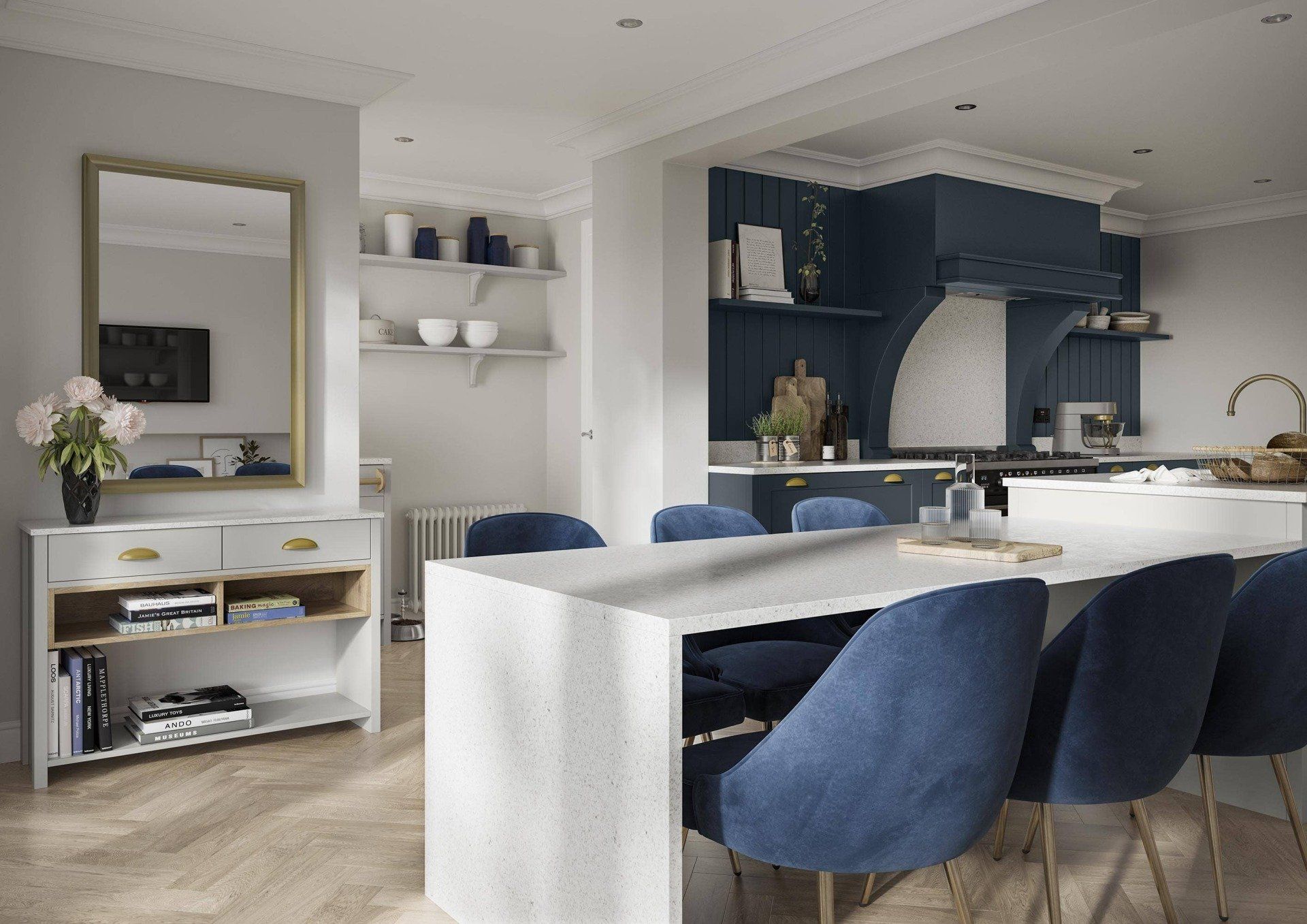 A modern kitchen and dining area featuring a white stone island, blue velvet chairs, and a console table with a mirror.