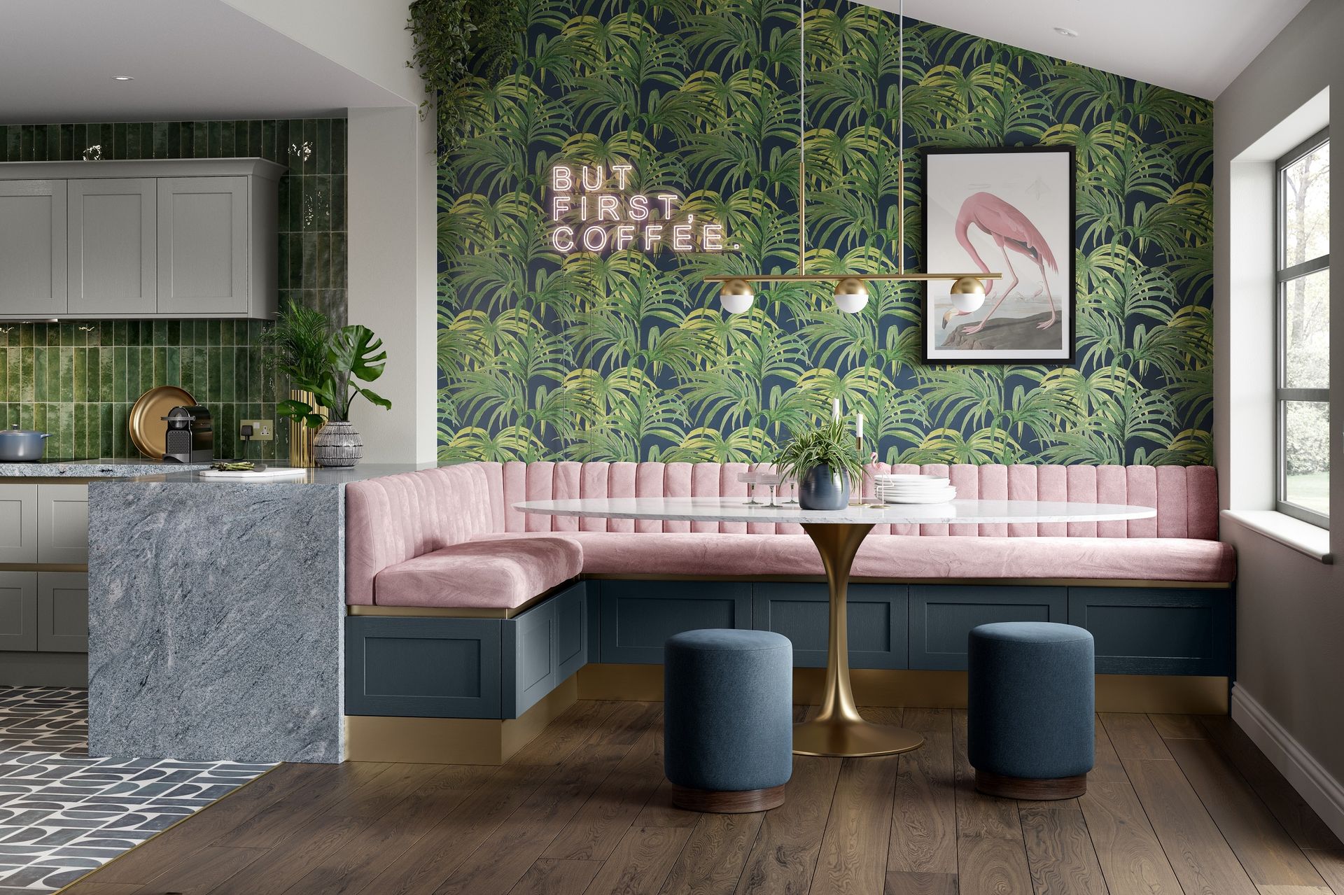 Modern dining nook with a pink tufted bench, dark blue cabinets, tropical wallpaper, and two blue ottomans.