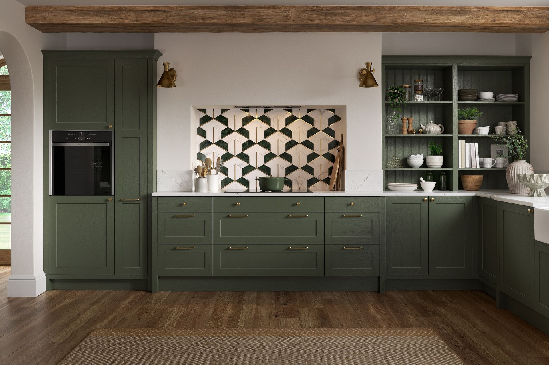 A modern kitchen featuring matte olive-green cabinets, a geometric tiled backsplash, open shelving, and a wood ceiling beam.