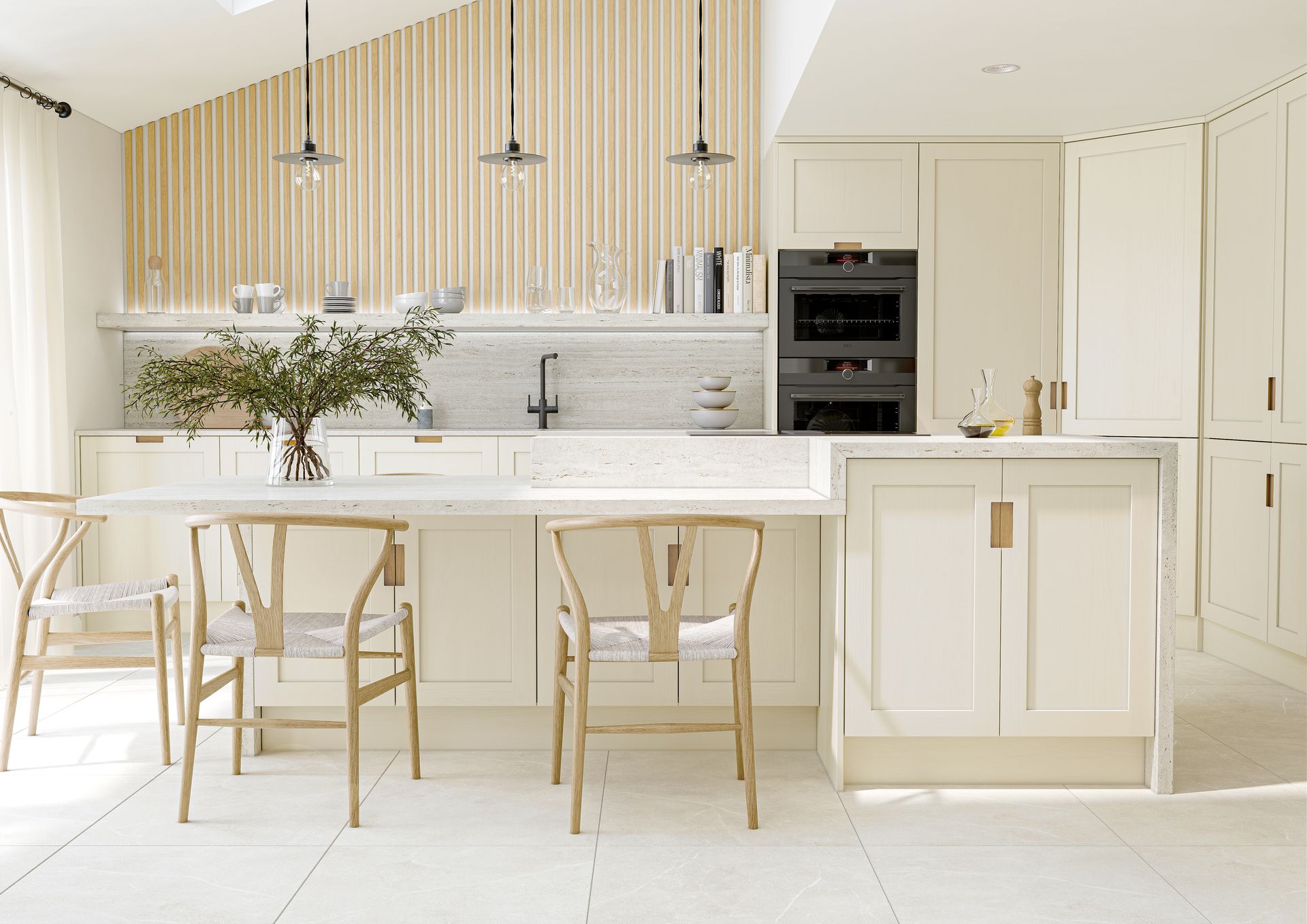 A modern, neutral-toned kitchen featuring a white island with a table extension, wooden chairs, and vertical slat walling.