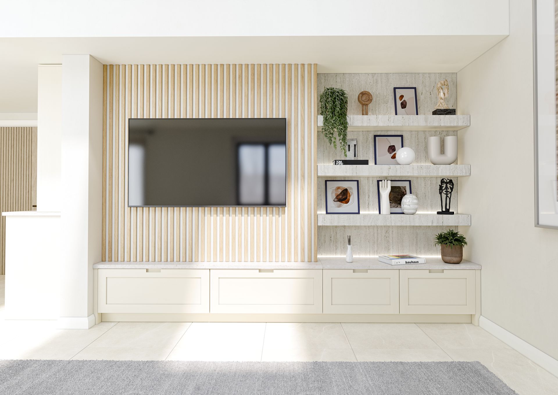 A TV mounted on a light wood-slat wall above off-white cabinets, with adjacent open shelves displaying decor.