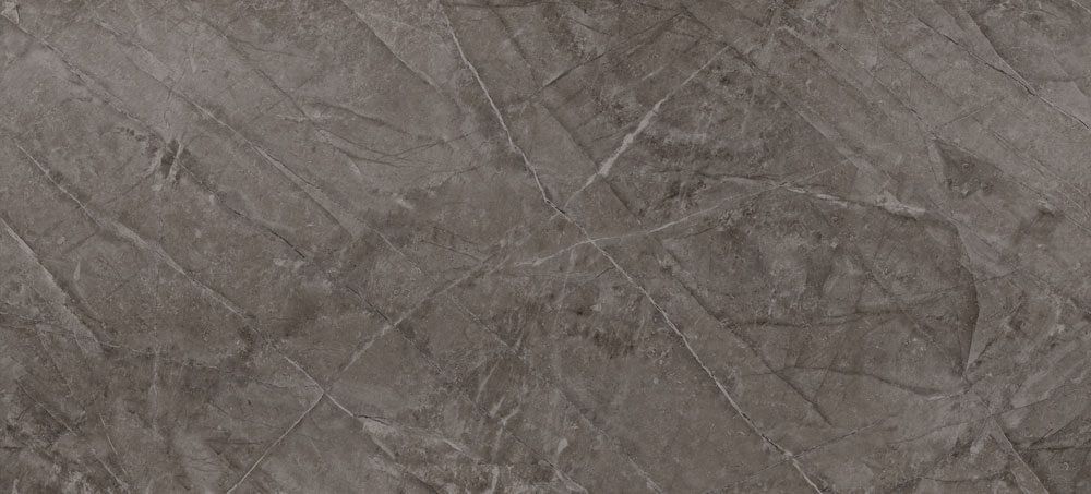 A textured surface in shades of charcoal gray, featuring subtle, light-colored veining resembling natural stone.