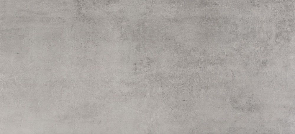 A textured light gray surface with subtle mottled patterns resembling concrete or stone tile.