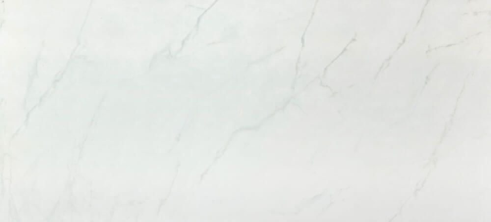 A light gray surface with subtle, thin, darker gray marble-like veining patterns throughout.