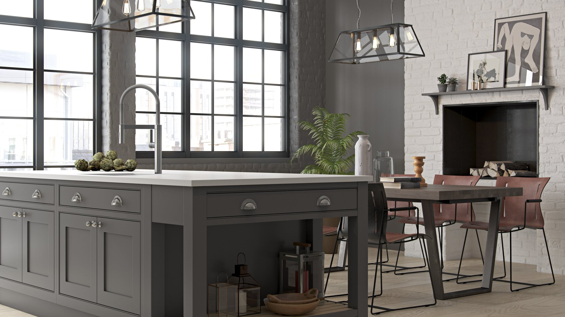 A modern kitchen featuring a dark grey island with a white countertop, industrial pendant lights, and a dining area.