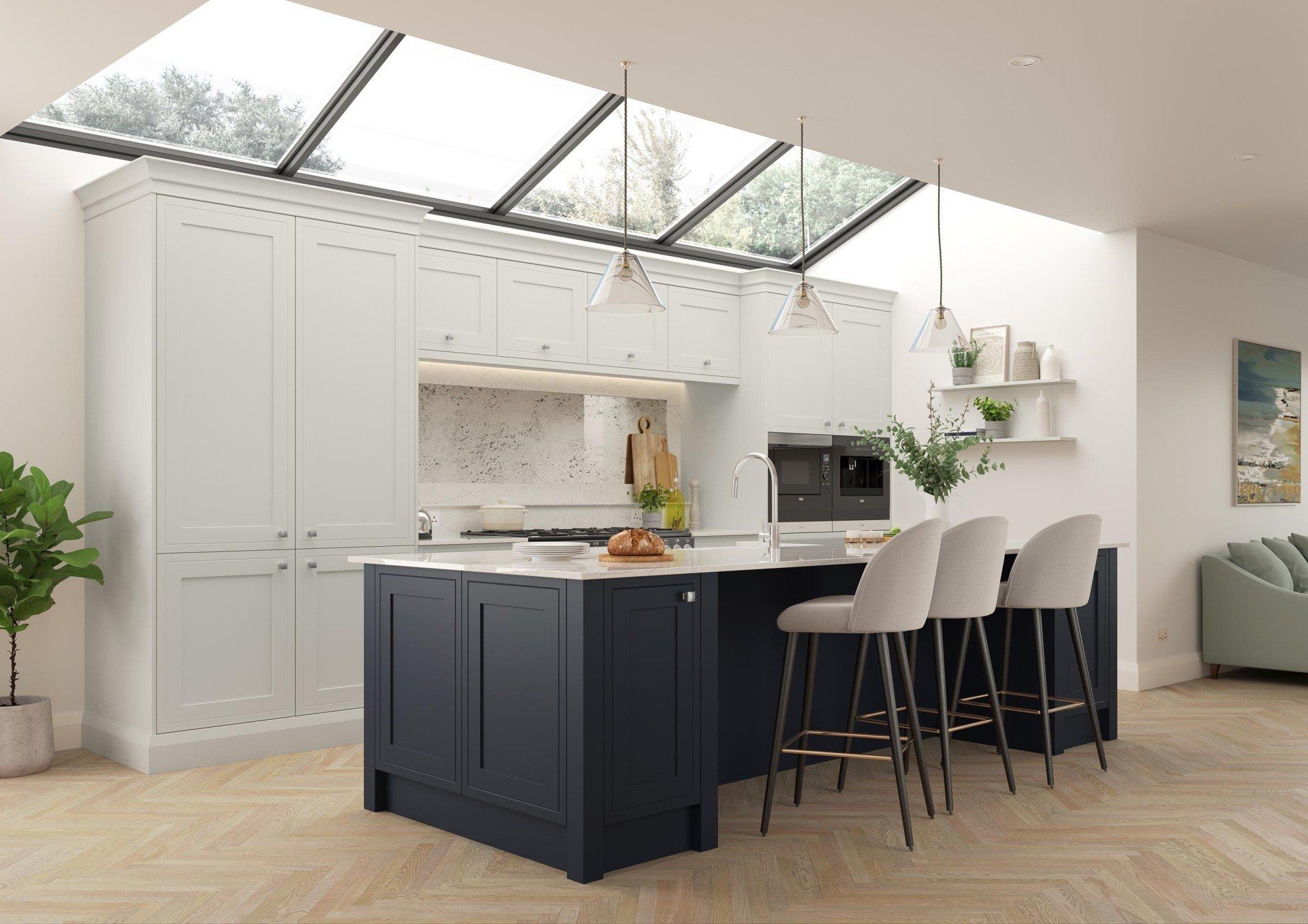 A modern kitchen featuring a dark blue island with three stools, white cabinets, and a large skylight over the room.