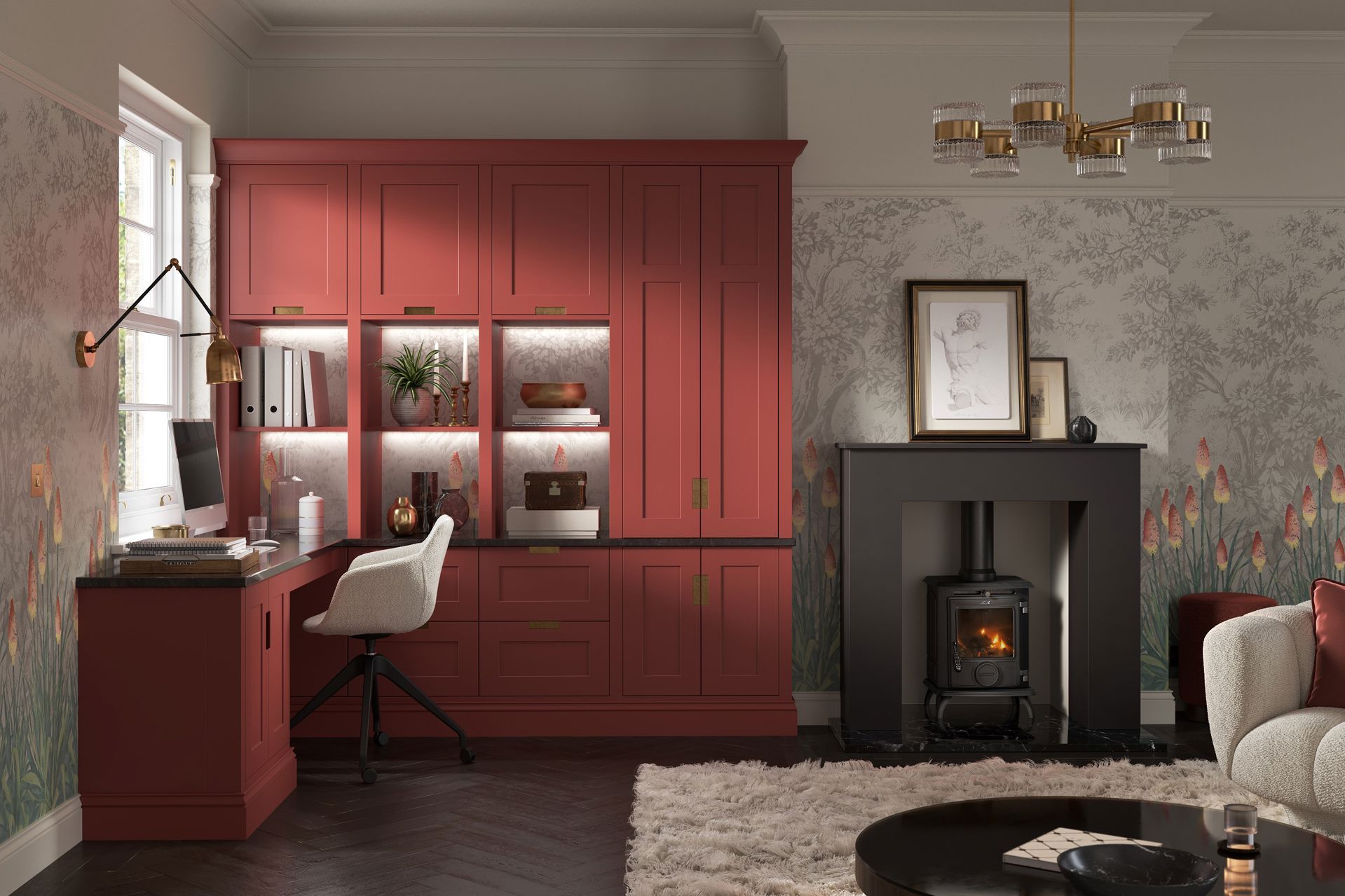 A home office with a red built-in desk and shelving unit, featuring an adjacent fireplace in a decorated living space.