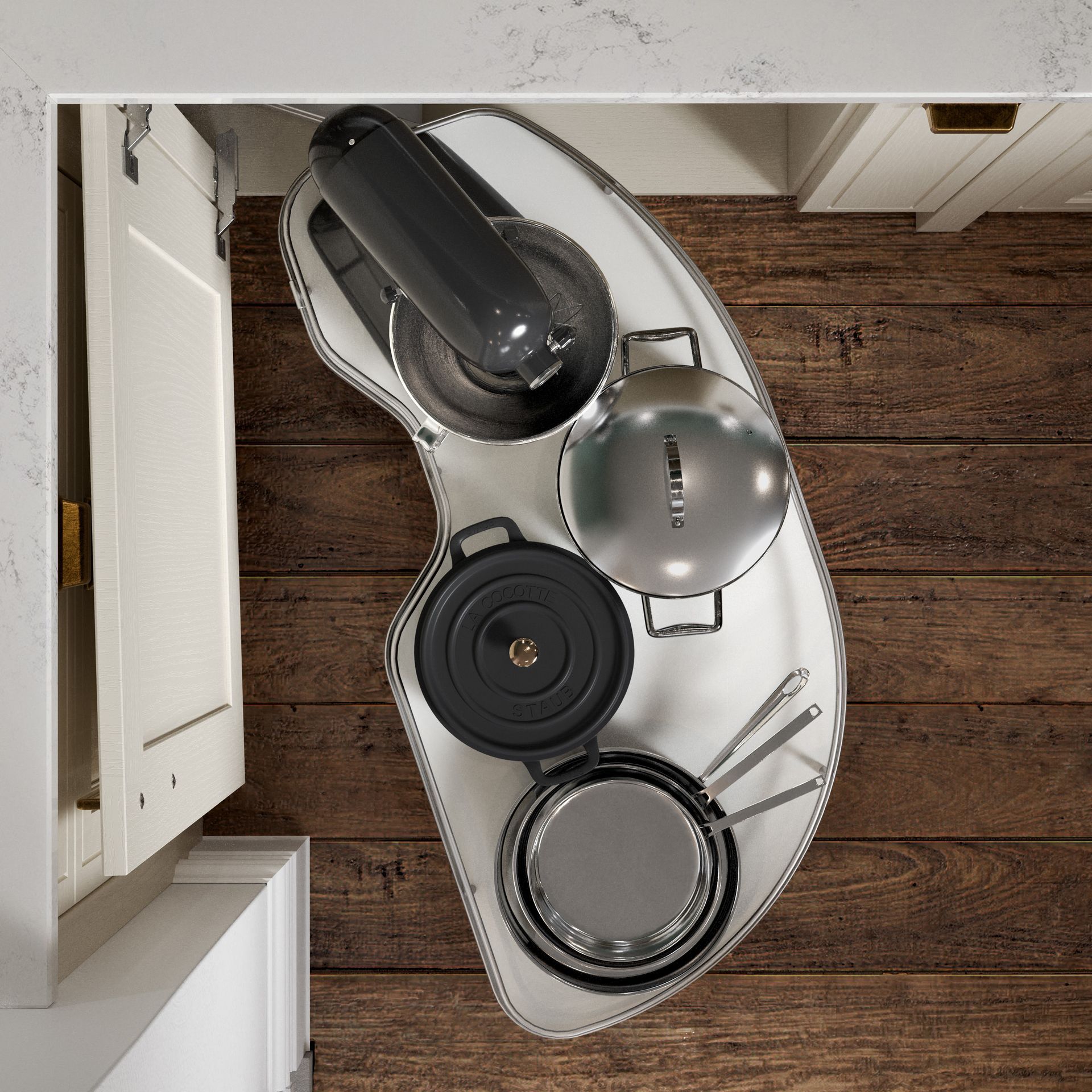 A pull-out, kidney-shaped corner kitchen cabinet shelf holding a mixer, a black dutch oven, and metal pots and pans.