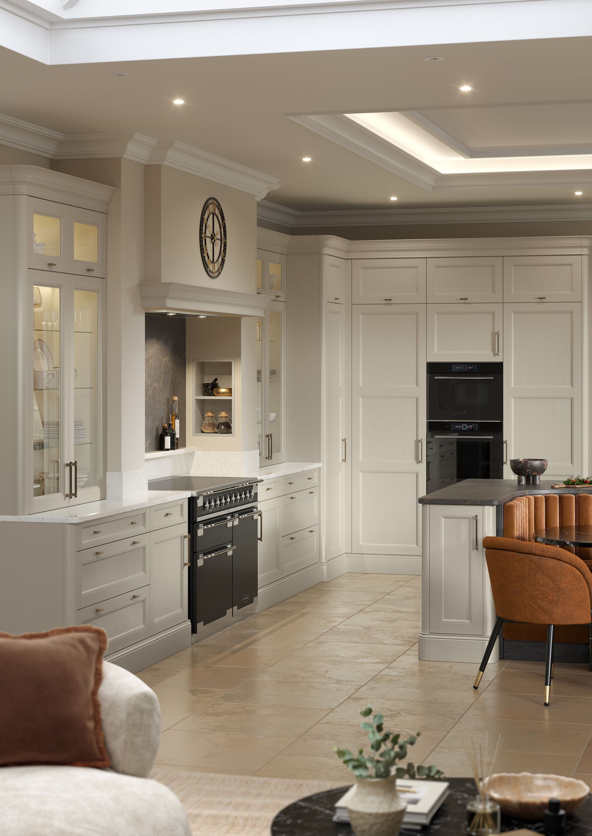 Elegant white kitchen with built-in appliances, marble floor, and a small dining area by the window.