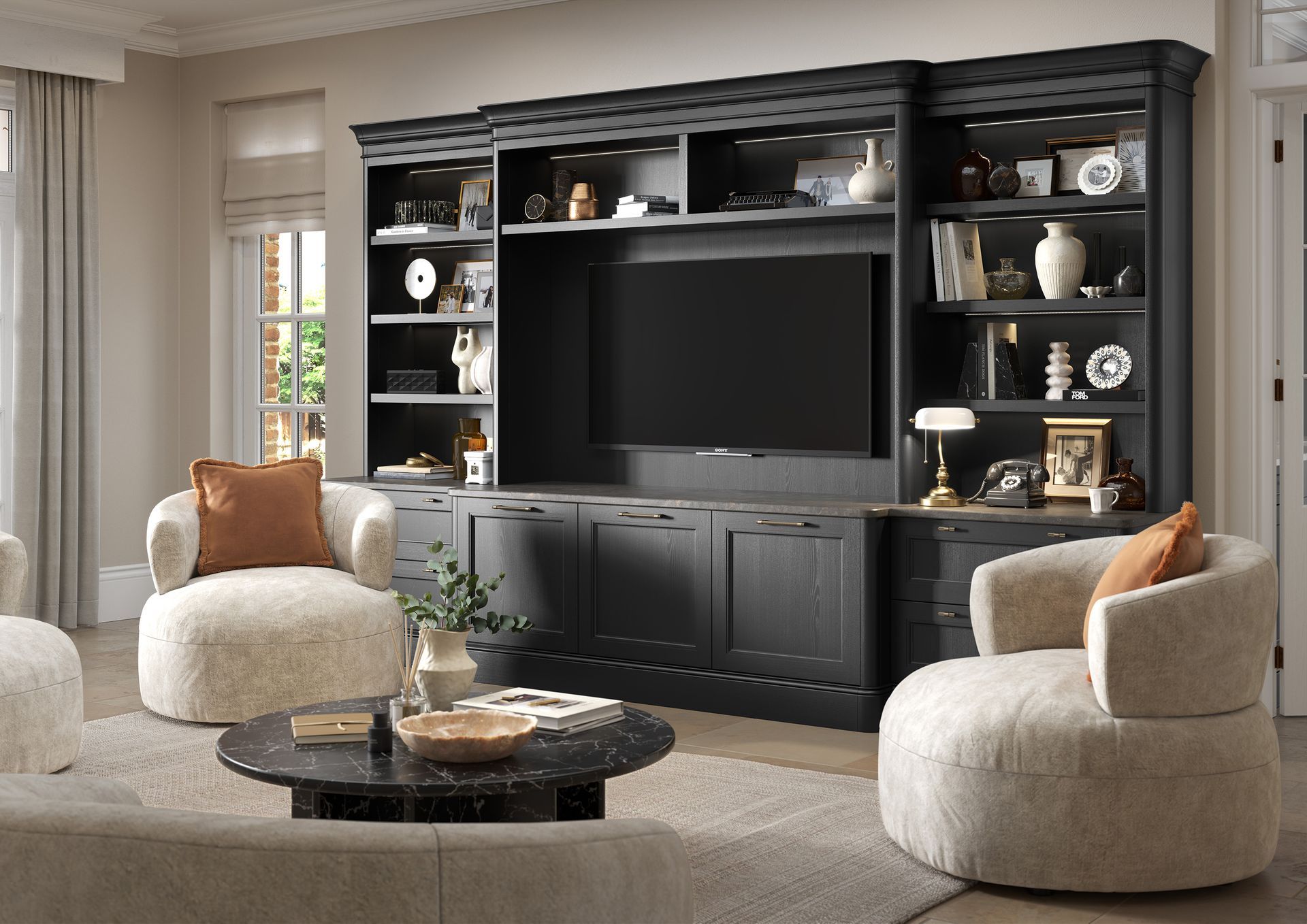 Elegant living room with black entertainment center, large TV, and two cream chairs by a coffee table