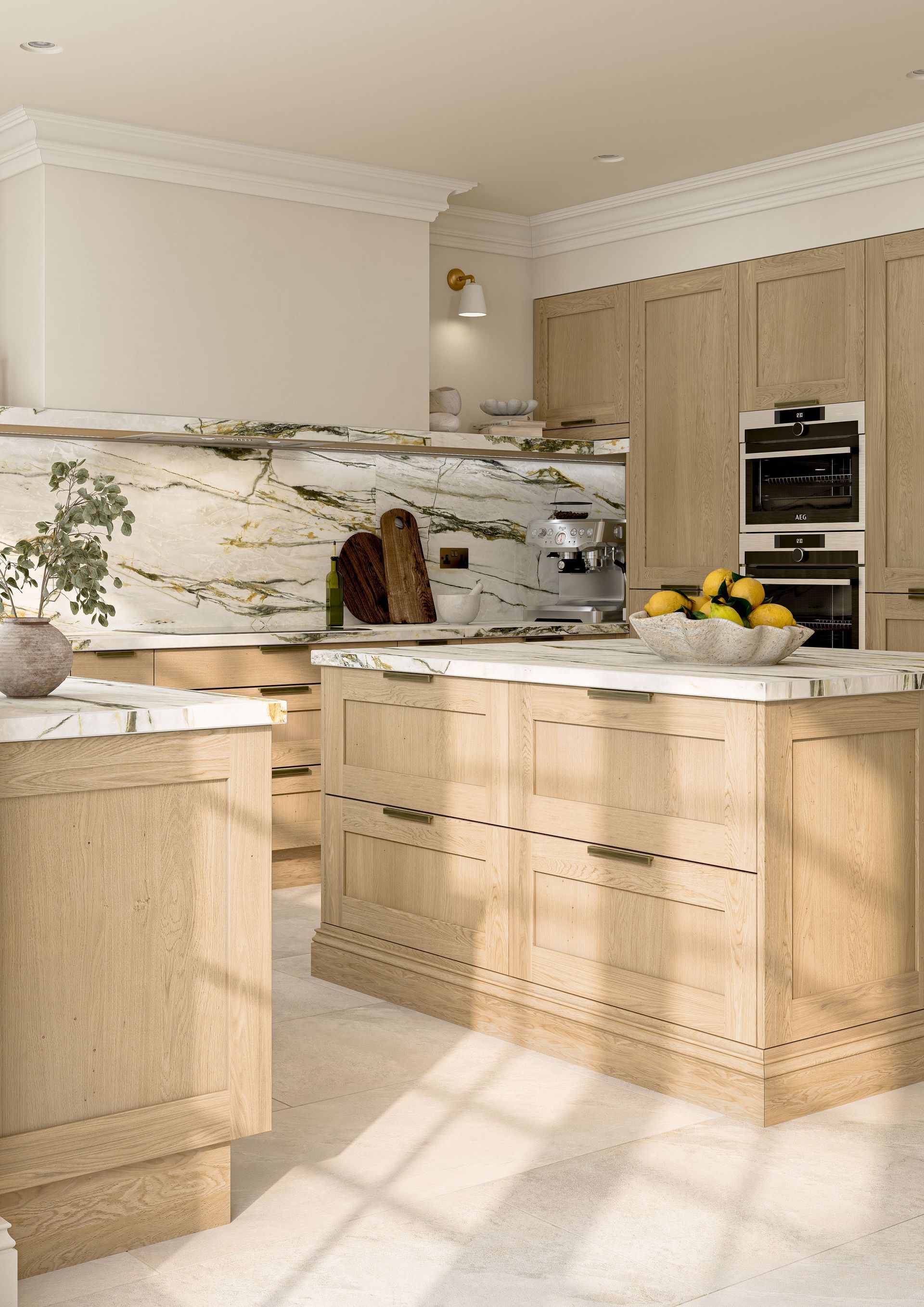 A kitchen with light wood cabinets, a marble backsplash, and a central island topped with a bowl of lemons.