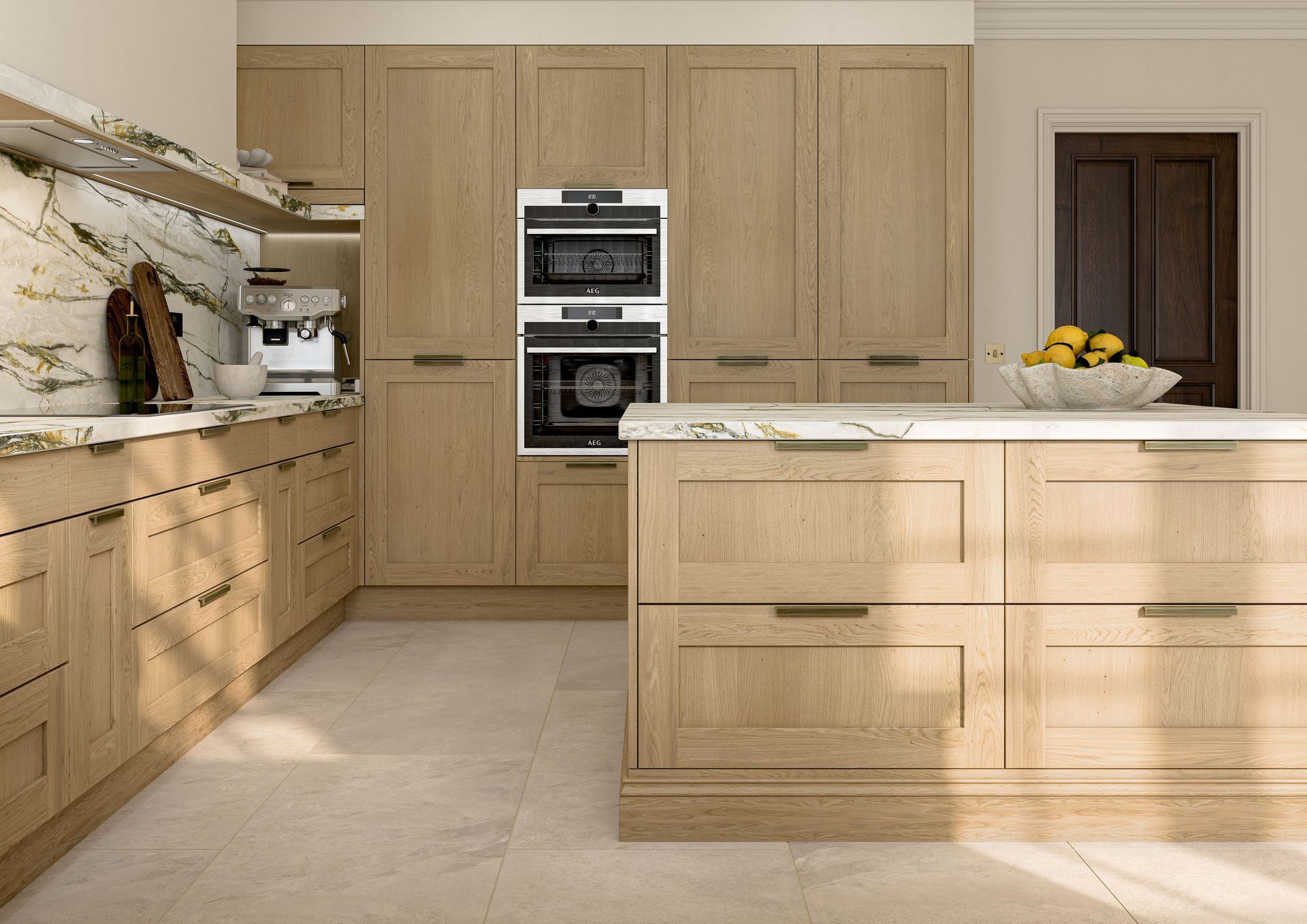 A modern kitchen featuring light wood cabinetry, marble countertops, and a central island on a tiled floor.