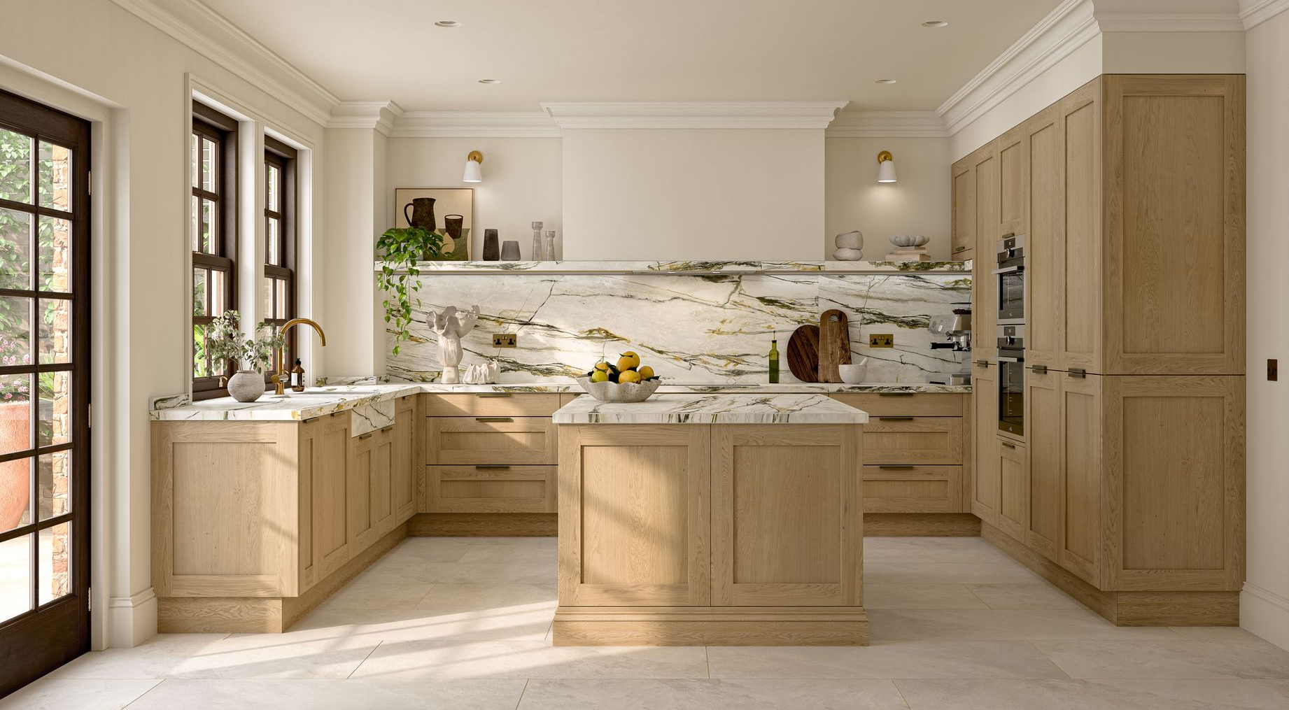 A bright kitchen with light oak cabinets, white marble countertops, and a matching kitchen island.