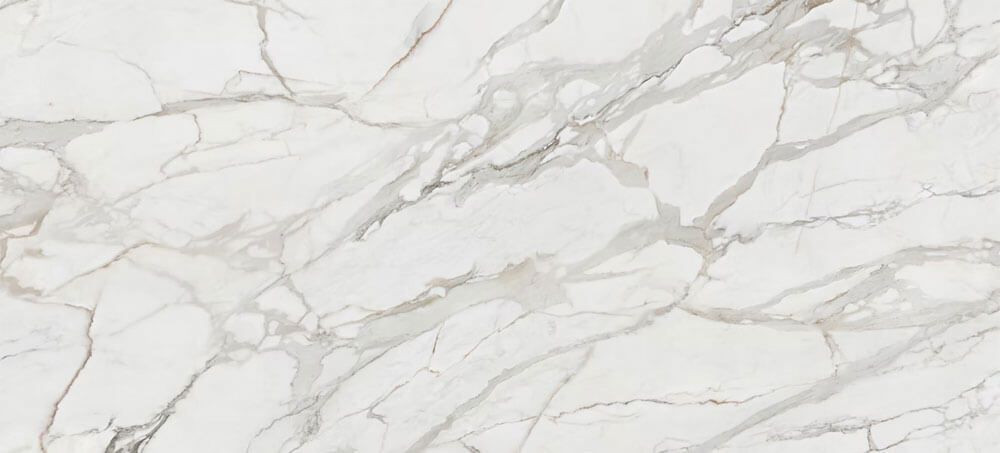 White marble slab with prominent grey veining in a diagonal pattern.