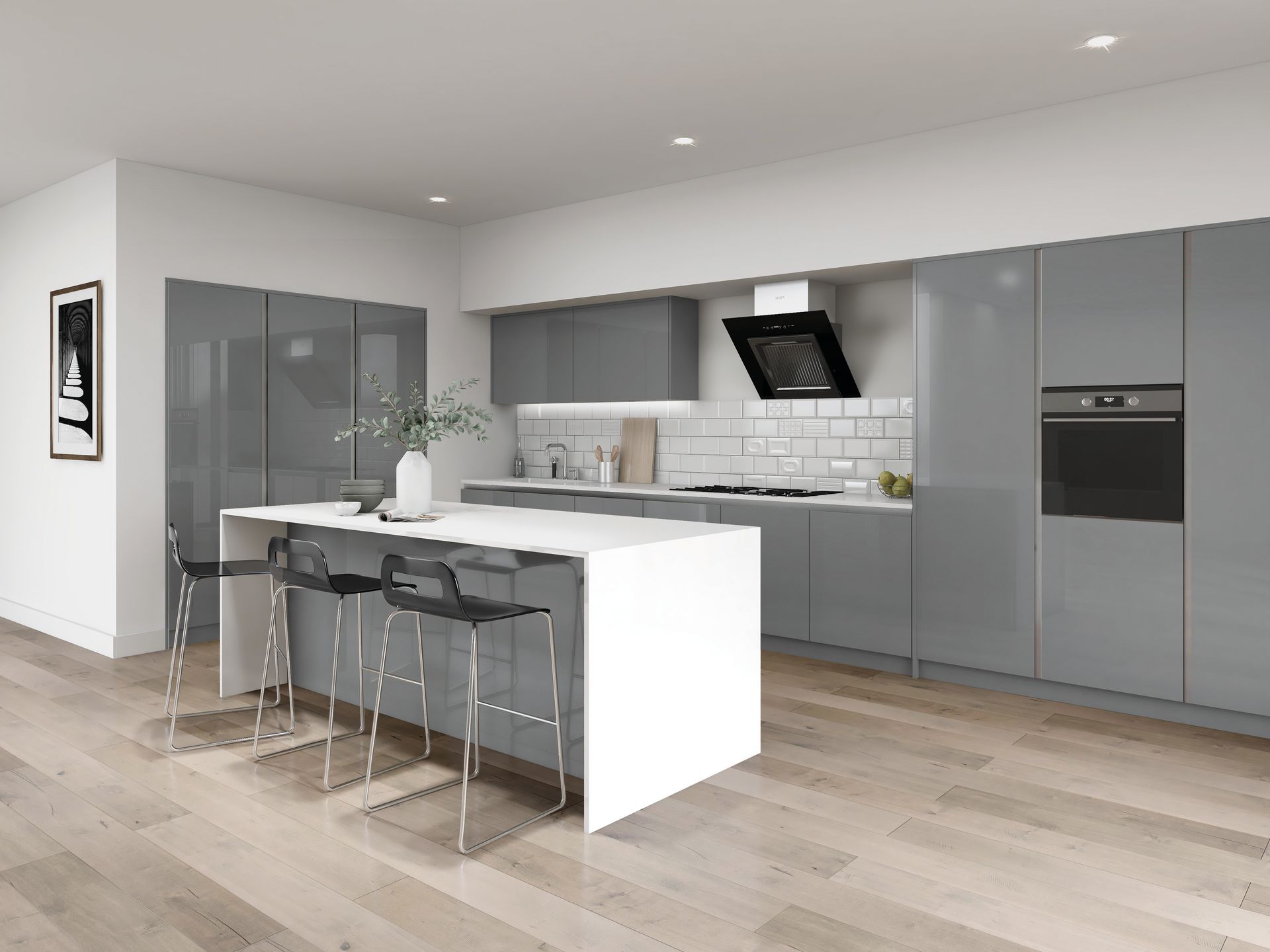 A modern kitchen with grey cabinets, a white island with three stools, subway tile backsplash, and light wood floors.