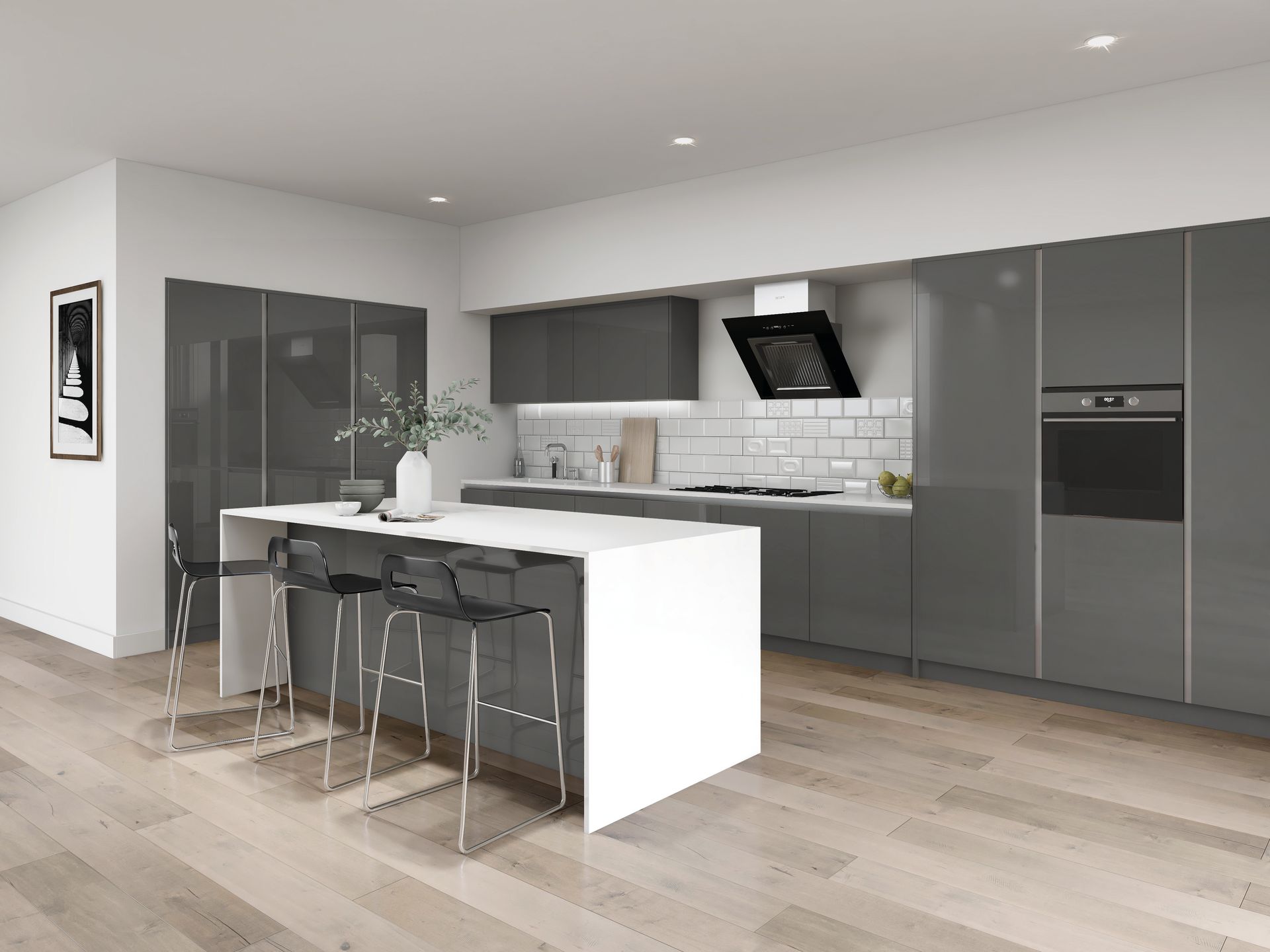 A modern kitchen with dark grey cabinets, a white waterfall island, bar stools, and light wood flooring.
