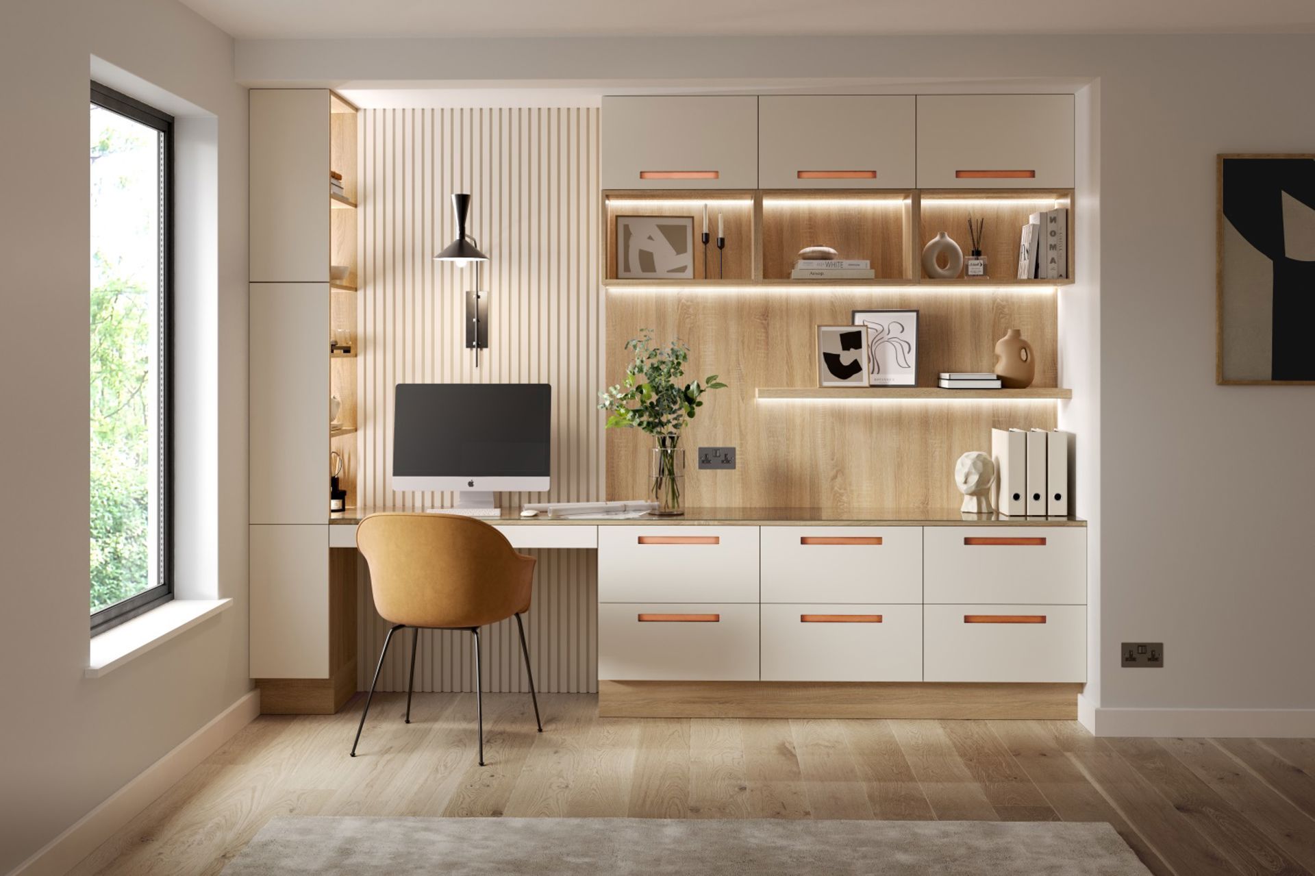 A modern home office featuring a desk, built-in cream cabinets, wood shelving with integrated lights, and a mustard chair.