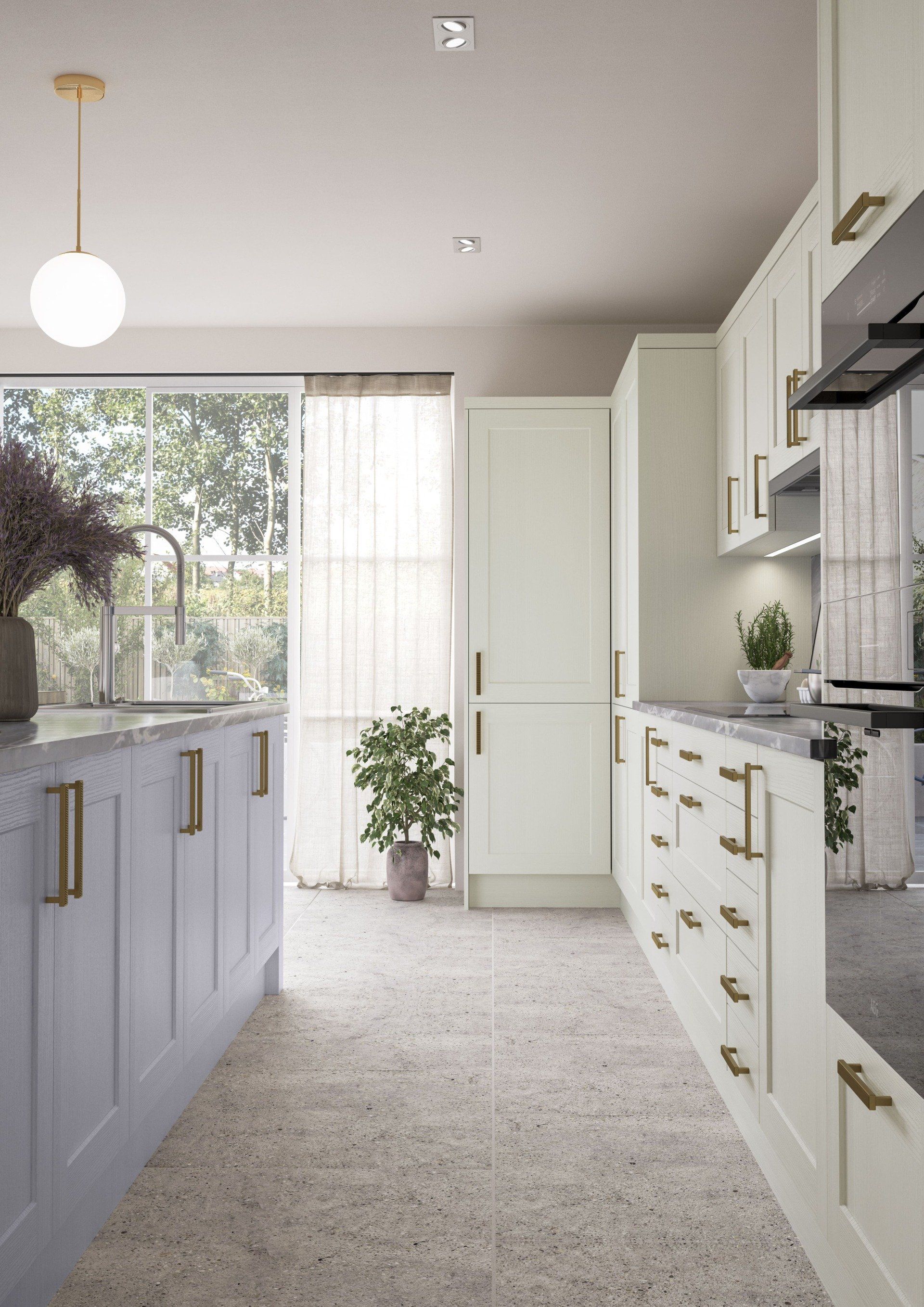 A modern kitchen with a lavender island, off-white cabinets, gold hardware, and light speckled terrazzo floors.