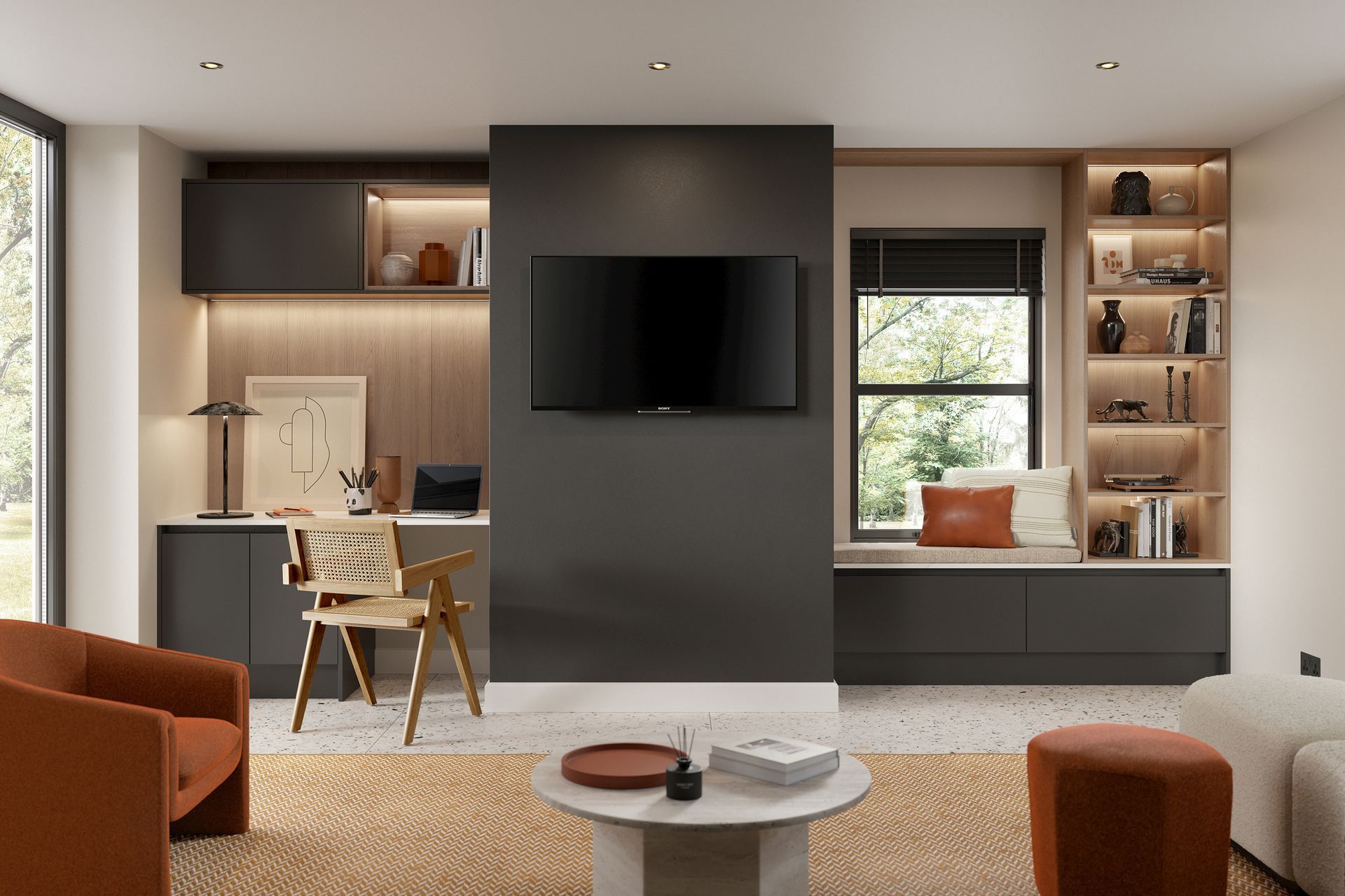 A modern living room with a TV on a dark central wall, a desk to the left, and a window nook with shelving to the right.