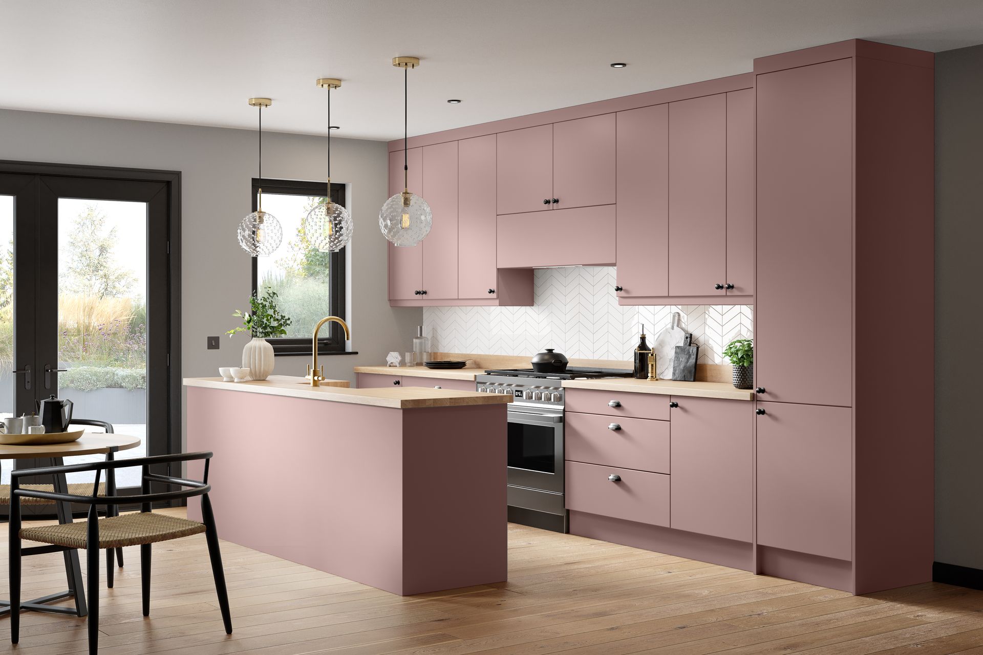 A modern kitchen with mauve cabinets, light wood countertops, a black range stove, and two pendant lights over a peninsula.