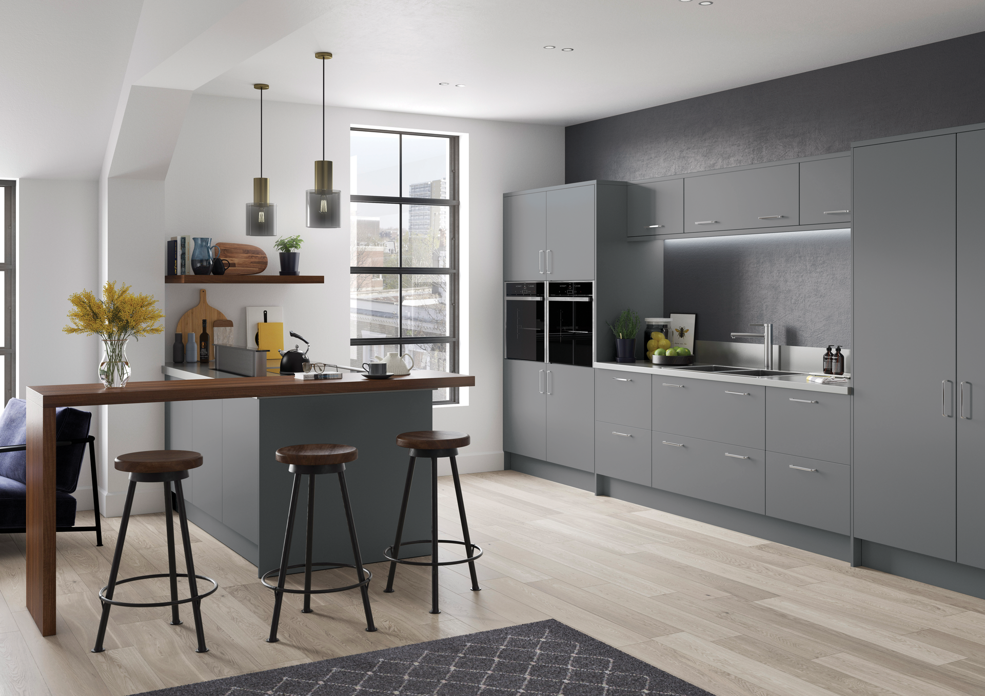 Modern gray kitchen with a breakfast bar, wooden countertop, three bar stools, and minimalist cabinetry.