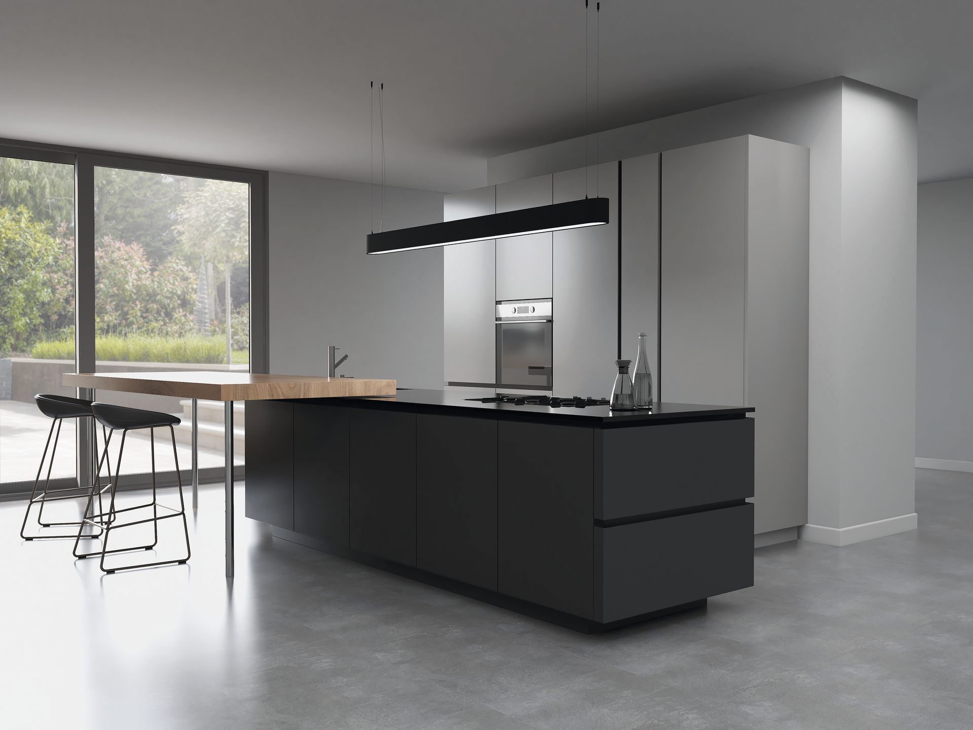 Modern kitchen featuring a black island with a wooden breakfast bar, minimalist light gray cabinets, and stools.