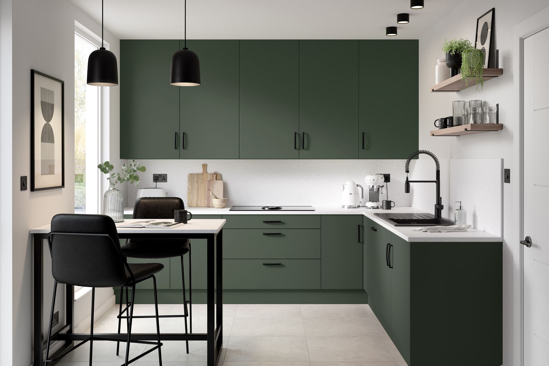 A modern kitchen featuring matte olive-green cabinets, white countertops, two black pendant lights, and a small dining area.