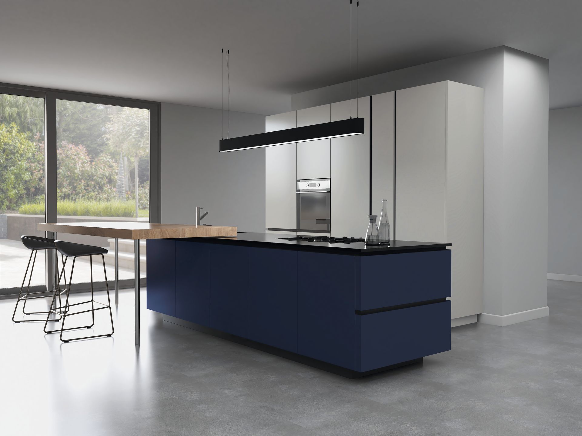 A modern kitchen featuring a dark blue island with a wooden breakfast bar and stools against white cabinetry.
