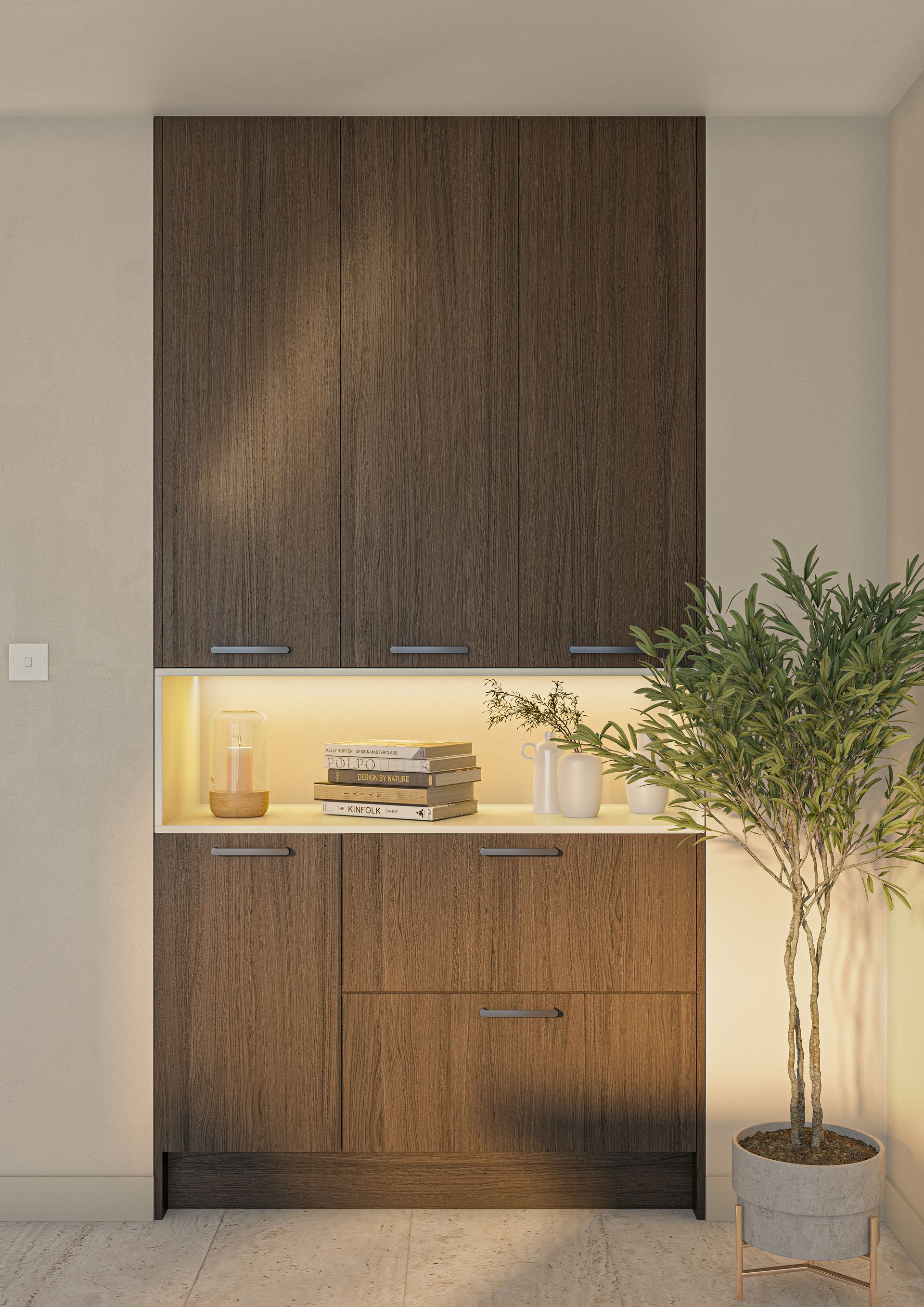 Dark wood cabinetry with an illuminated center shelf holding decor, next to a potted plant in a room with stone flooring.