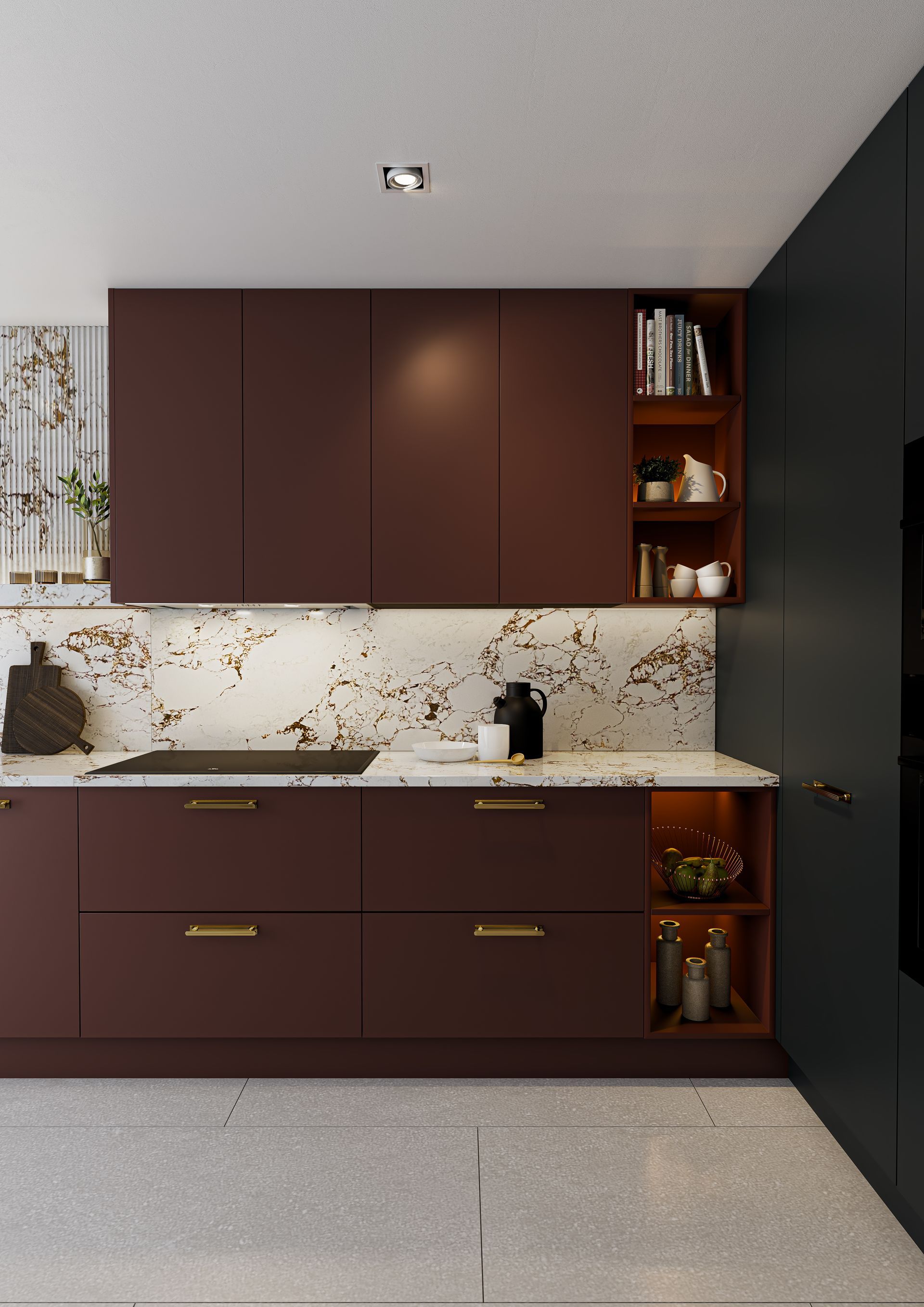 A modern kitchen featuring matte burgundy cabinets, gold hardware, white marble countertops, and open wooden shelving.
