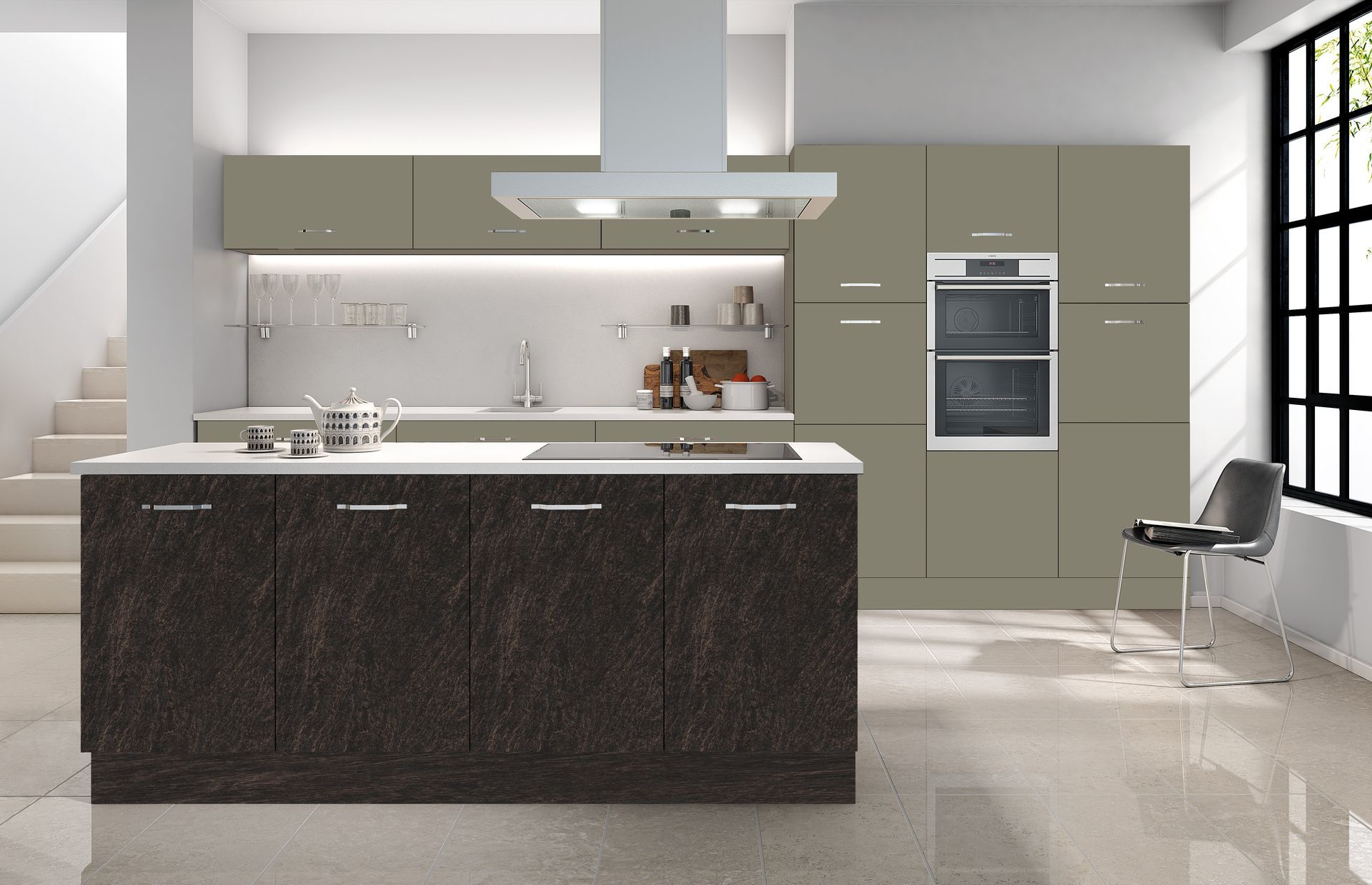 A modern kitchen featuring a dark textured island, light taupe cabinets, a wall-mounted double oven, and a dining chair.