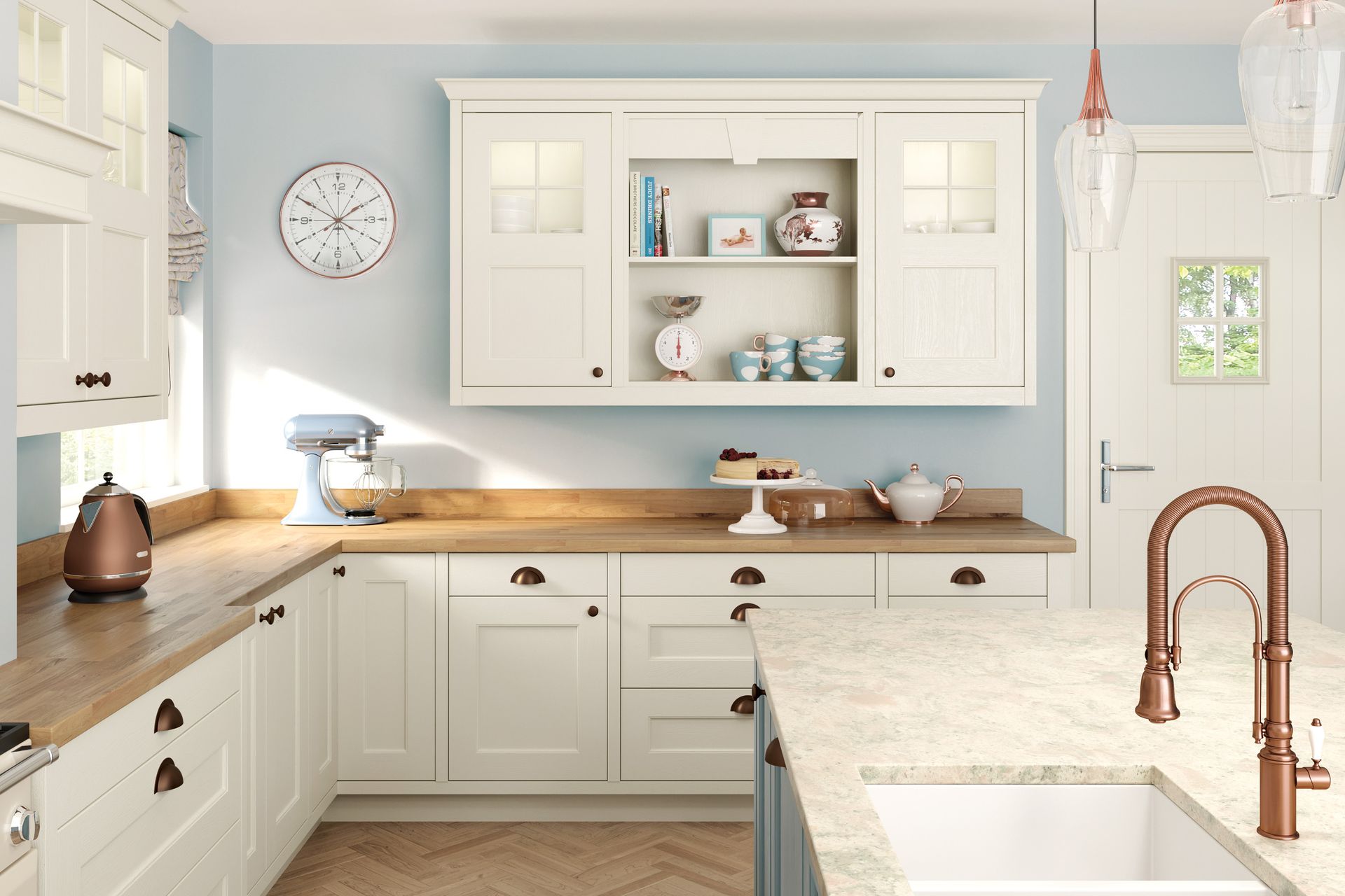 A modern kitchen with cream-colored cabinets, light blue walls, wood countertops, and a copper faucet on a kitchen island.