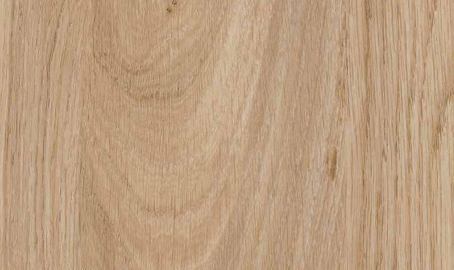 Close-up of a light brown, natural wood grain texture with vertical patterns and swirling knots.