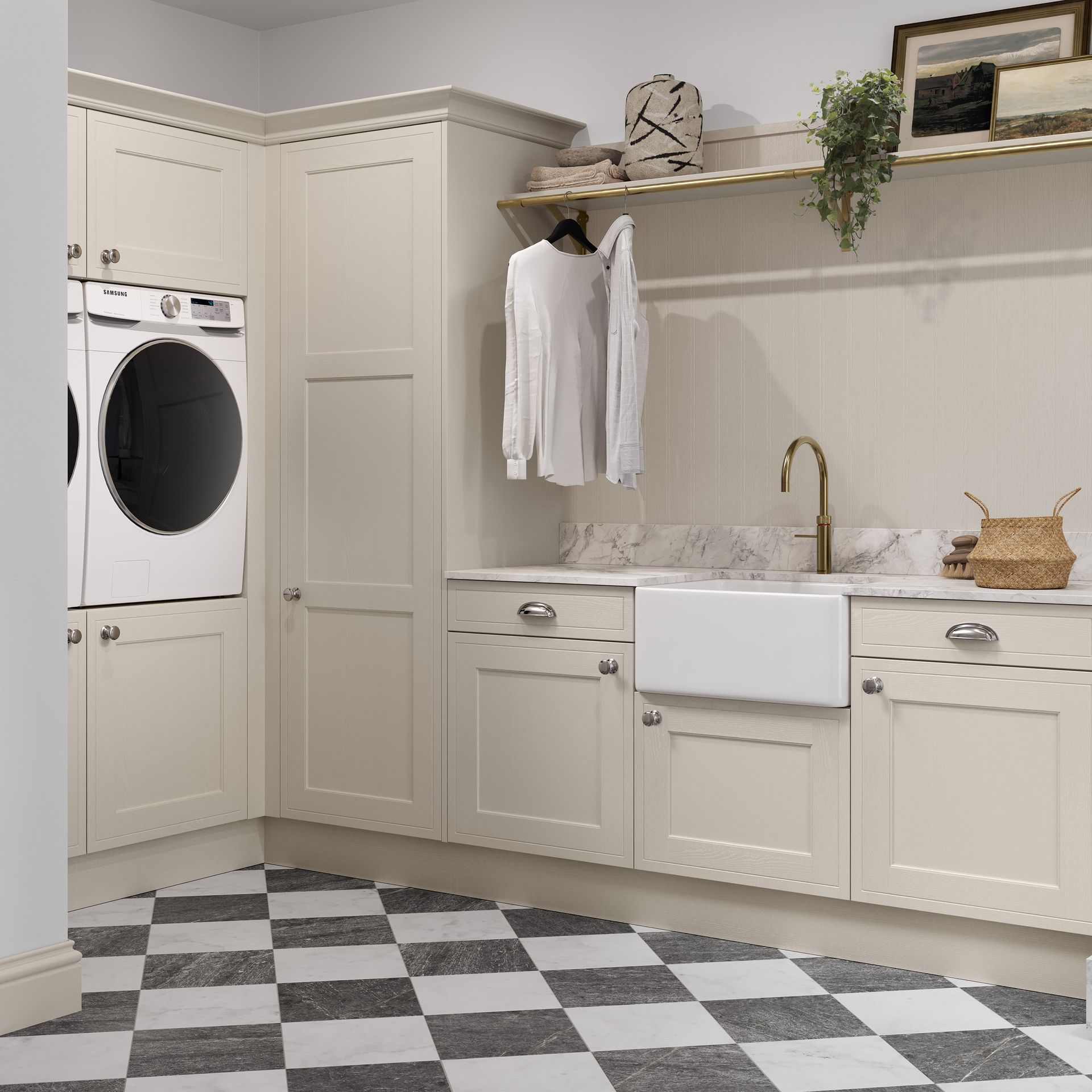 A laundry room featuring cream-colored cabinets, a white farmhouse sink, a built-in dryer, and checkered floor tiles.