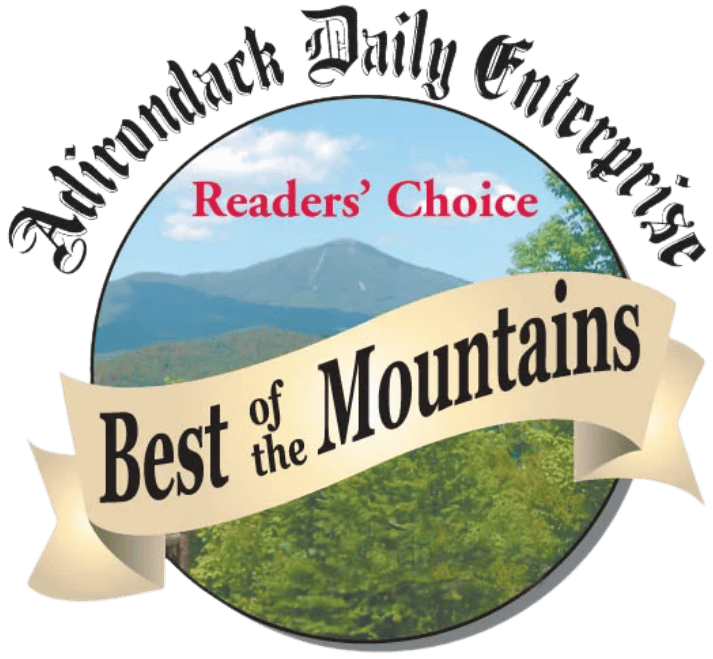 Newspaper “Readers’ Choice” badge for Best of the Mountains with mountain landscape background