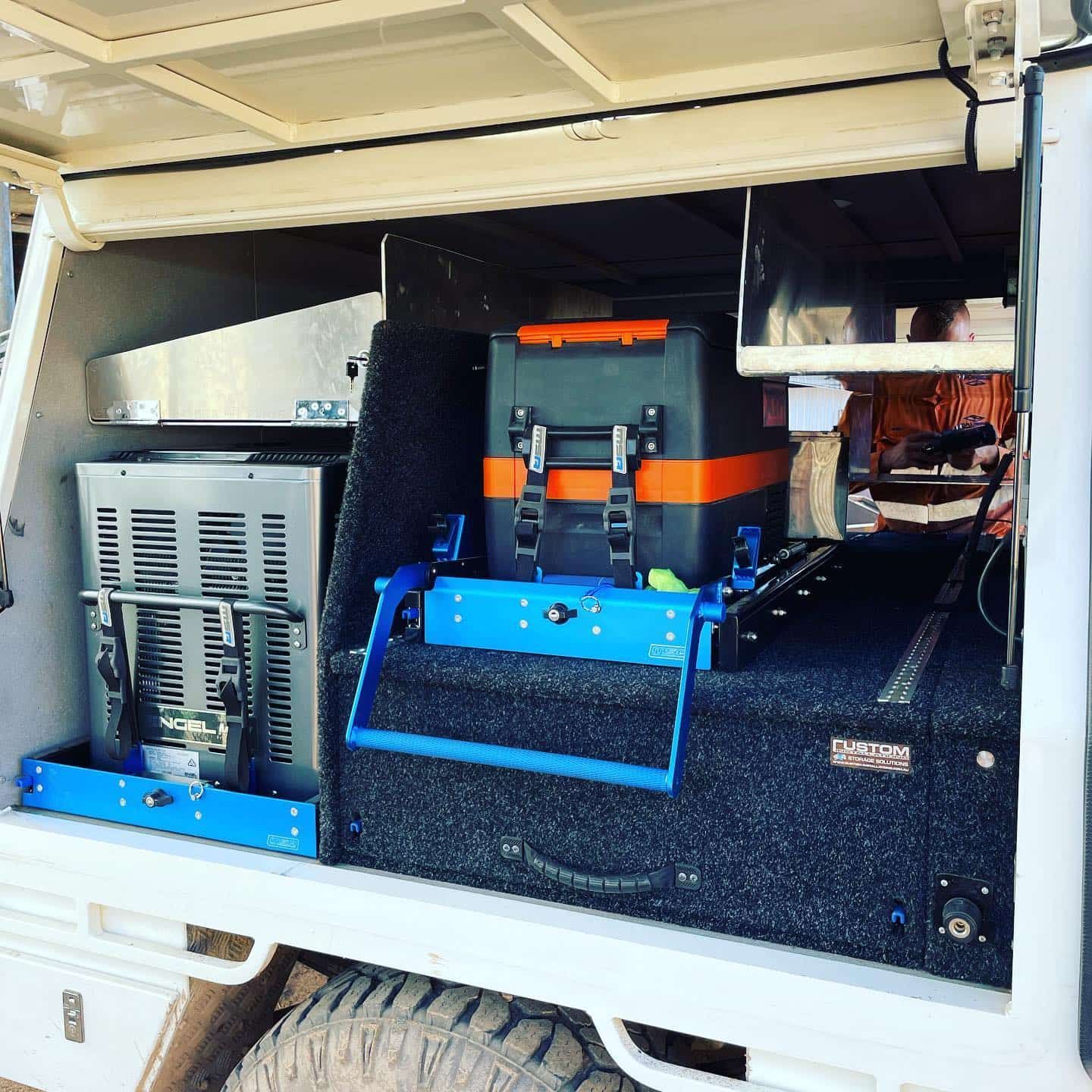 Back Of A Truck With A Cooler And Other Items In It — Calibre Engineering In Mica Creak, QLD