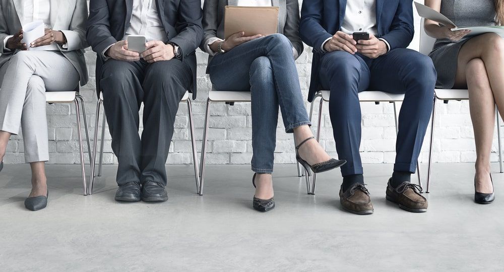 Group Of People Sitting In Chairs Waiting For A Job Interview — Calibre Engineering In Mica Creak, QLD