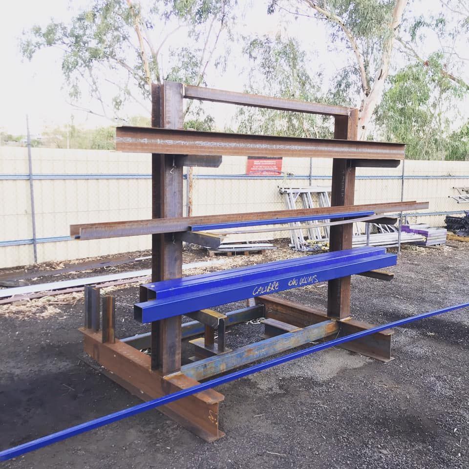 Metal Rack With A Blue Beam On Top Of It — Calibre Engineering In Mica Creak, QLD
