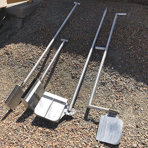 Couple Of Shovels Sitting On Top Of A Pile Of Gravel — Calibre Engineering In Mica Creak, QLD