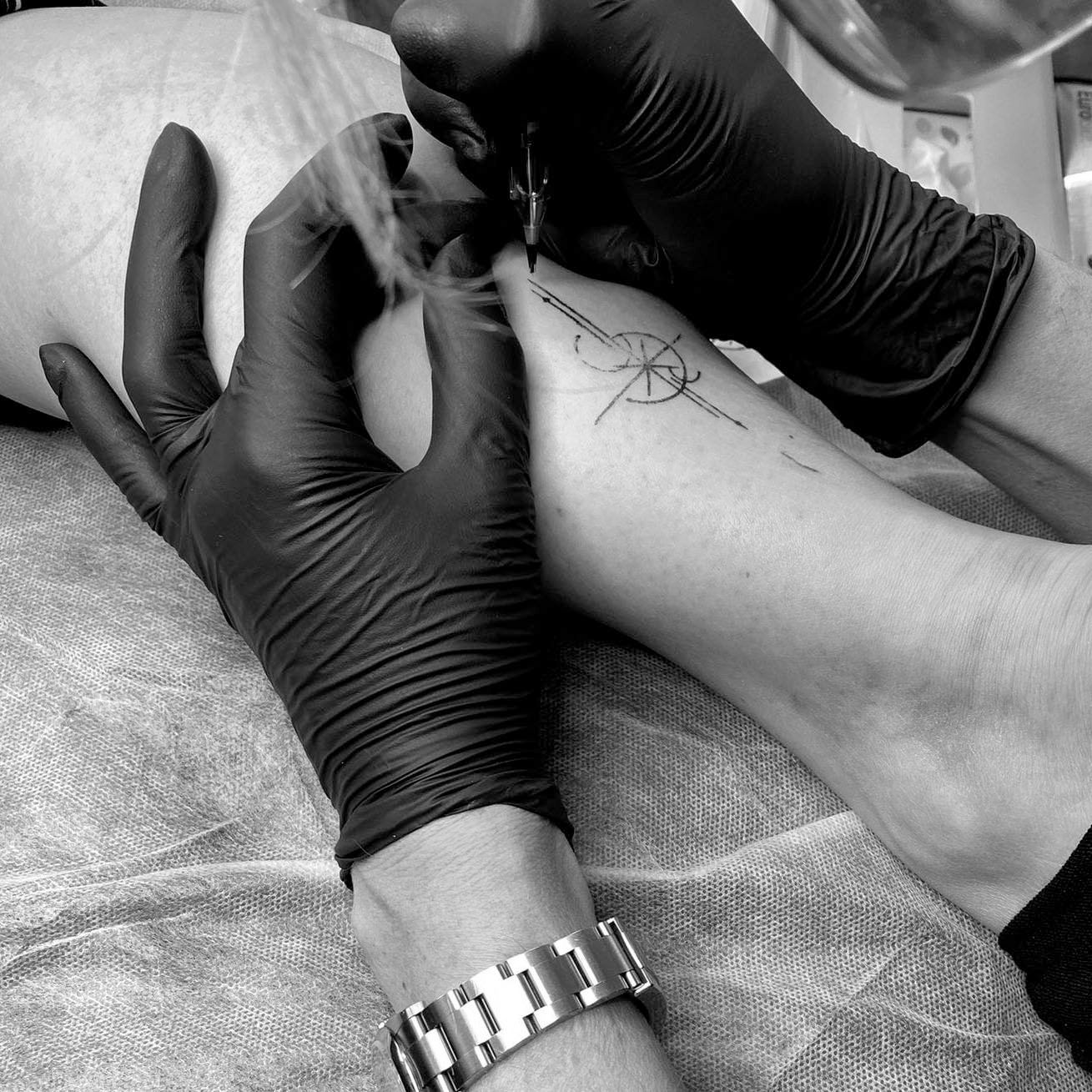 Fine line tattoo