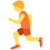 Person jogging on a white background, wearing orange shirt and red shorts, holding a yellow bottle