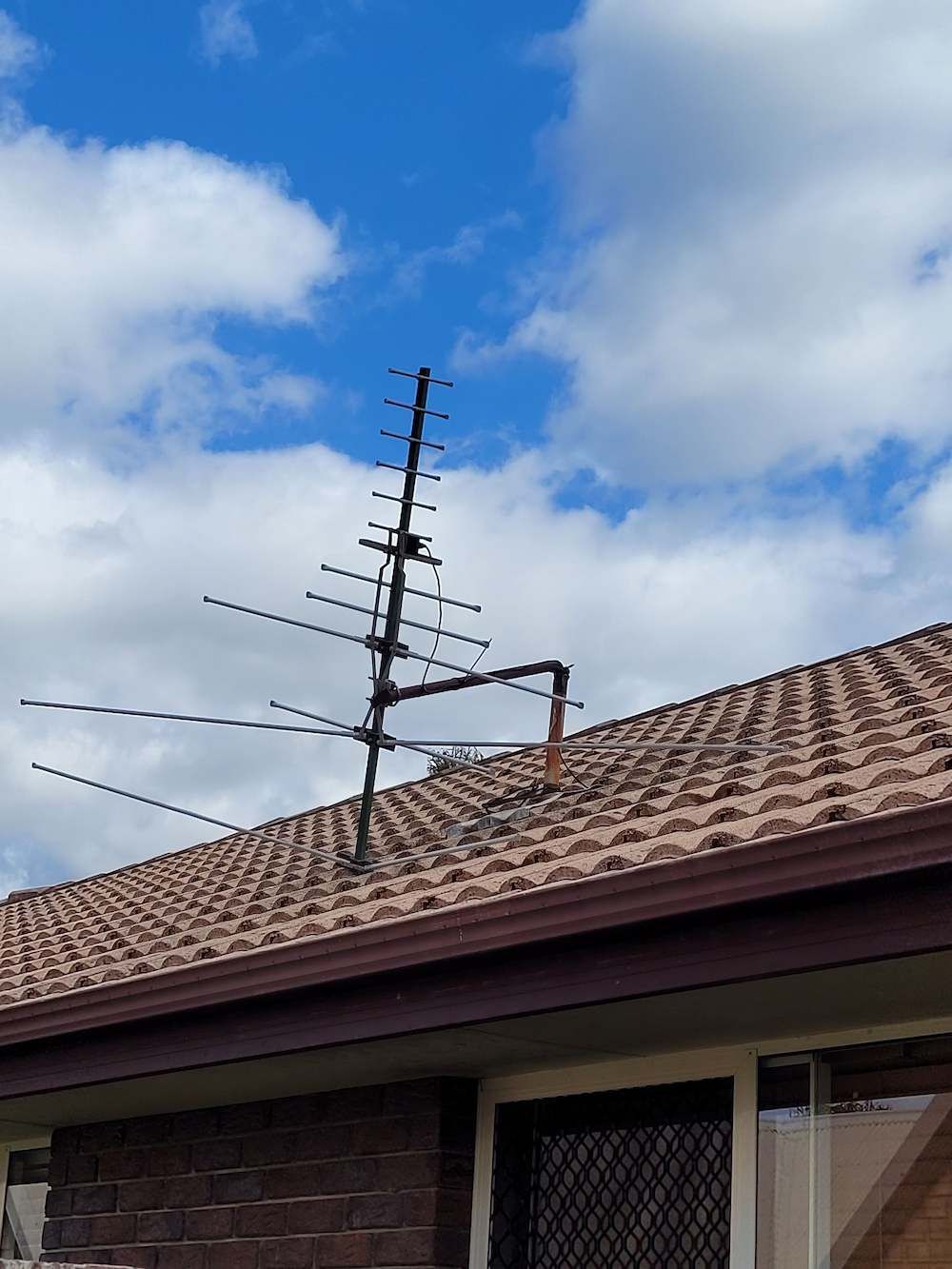 Broken Antenna on a roof  — Brisbane Antenna Specialists in Brendale, QLD