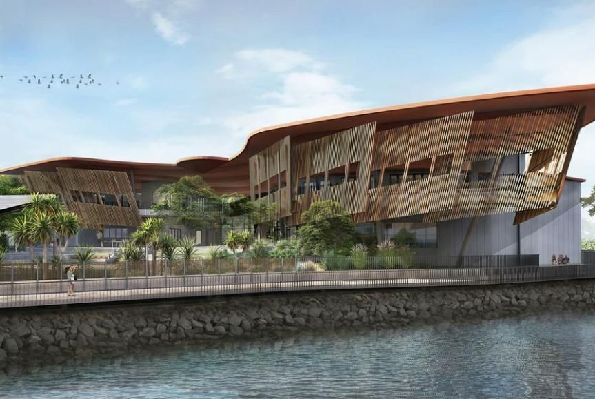 A Modern Building With a Wavy Orange Roof and Wooden Lattice — Arctic Installations in Winnellie, NT