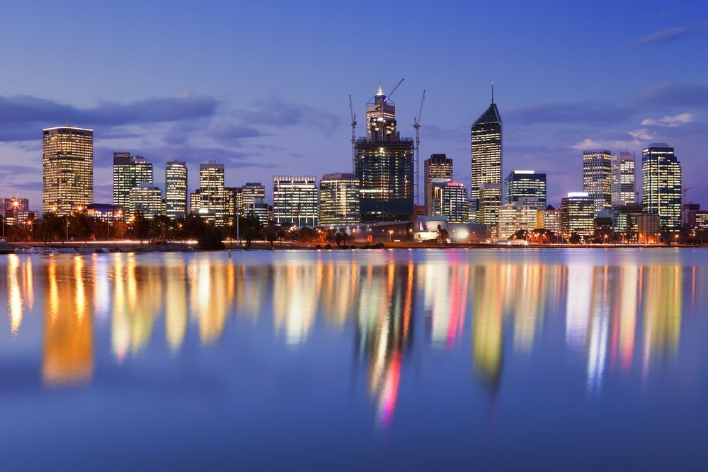 City Skyline At Dusk Reflected In Calm Water — Arctic Installations in Perth, WA