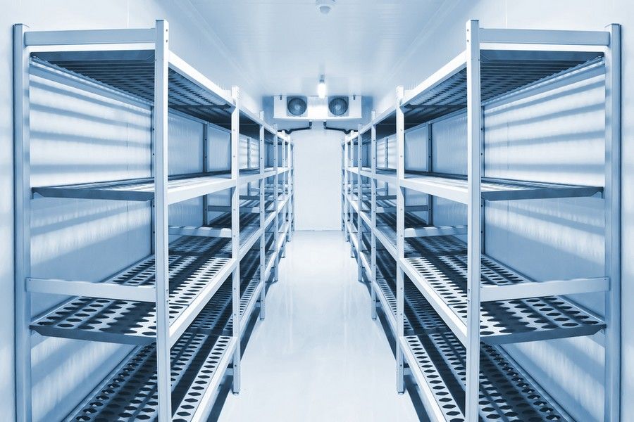 A Row of Empty Shelves in A Warehouse — Arctic Installations in Winnellie, NT