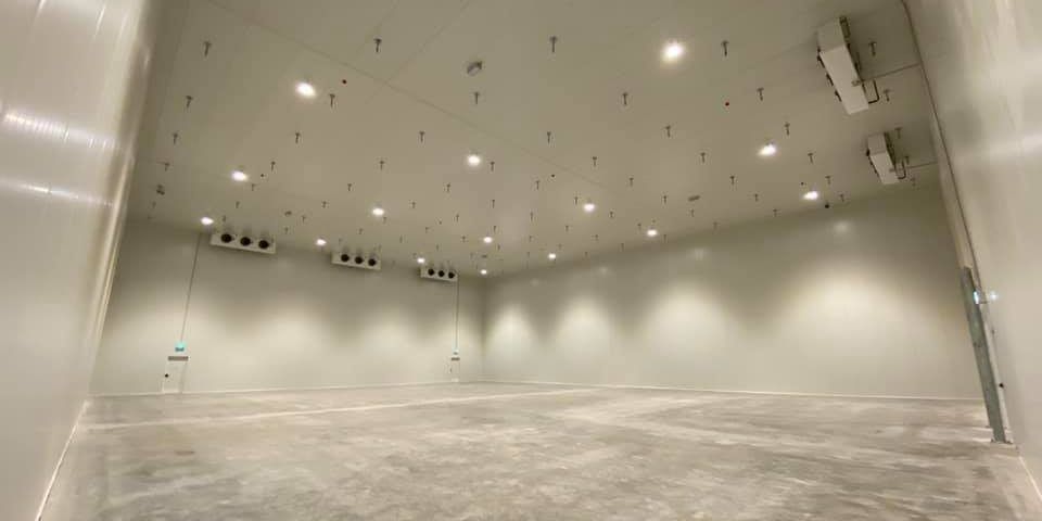 A Large Empty Room with A Lot of Lights on The Ceiling — Arctic Installations in Tasmania